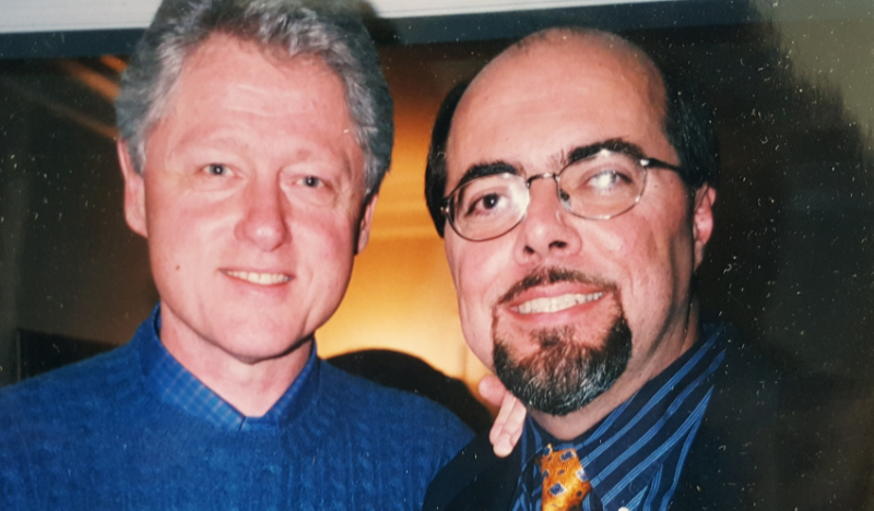 Tom is pictured with then President Bill Clinton in 2000.
