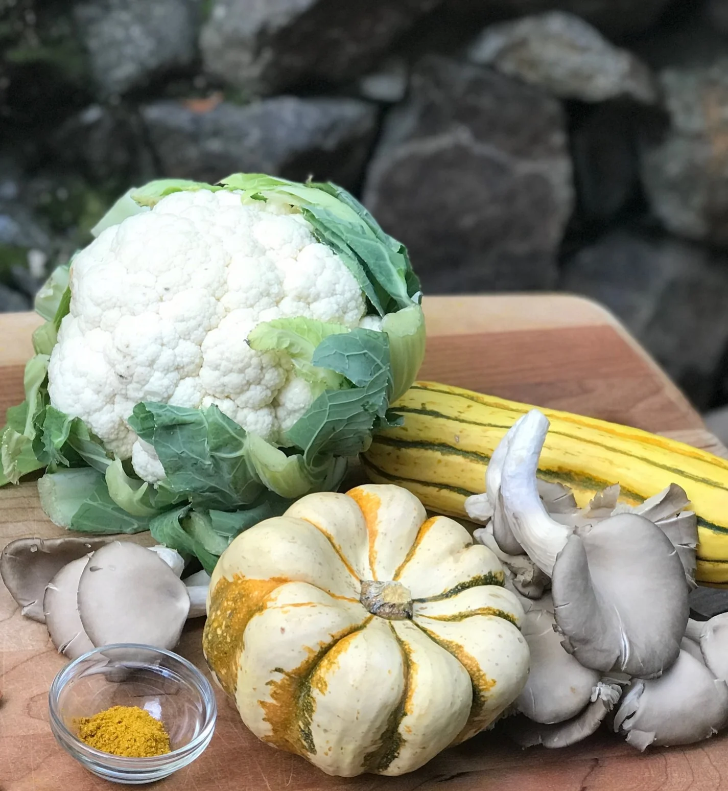 Cauliflower, carnival and delicata squash, curry powder, oyster mushrooms.