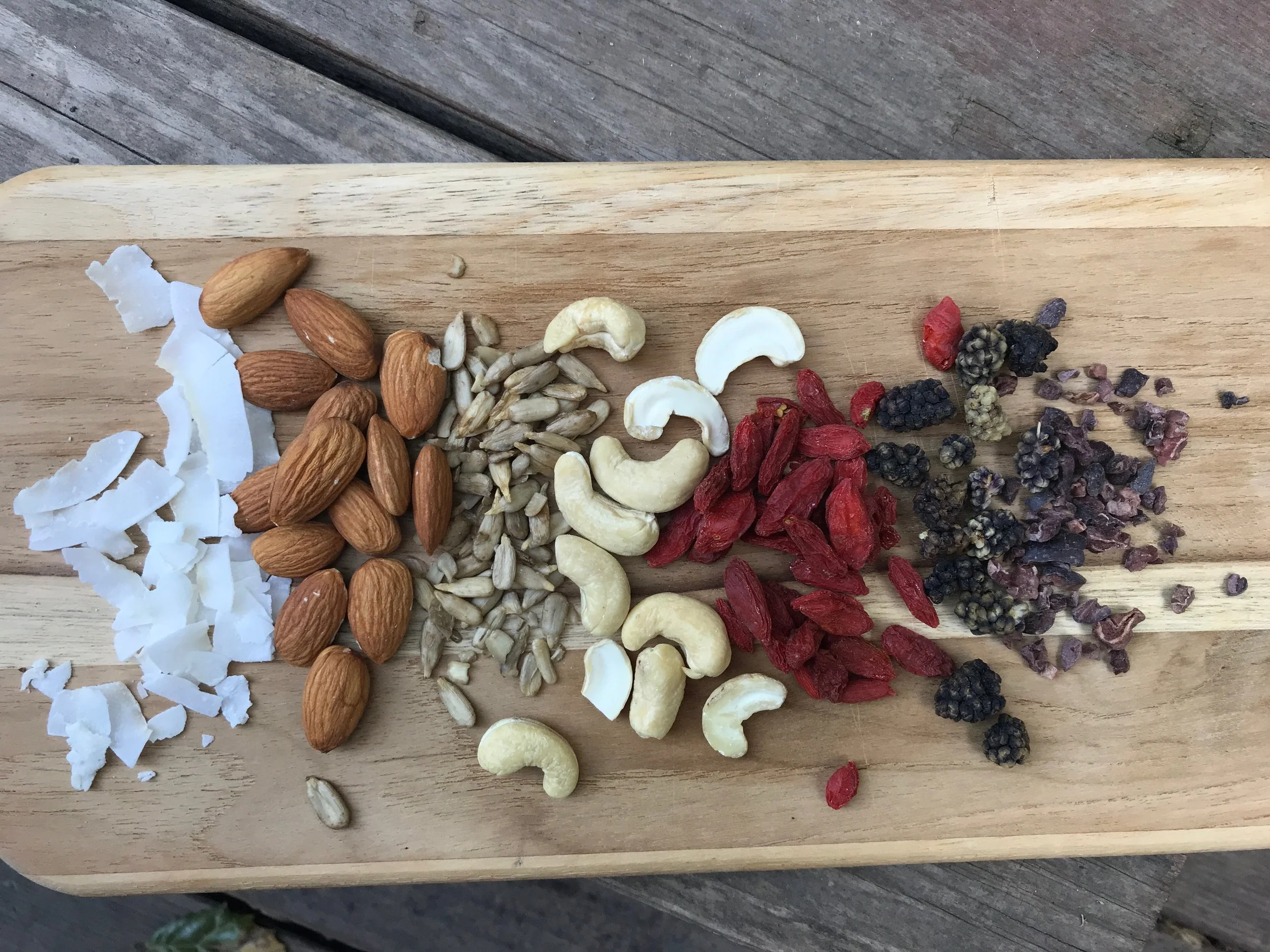 Coconut chips, almonds, sunflower seeds, cashews, goji berries, mulberries, cacao nibs