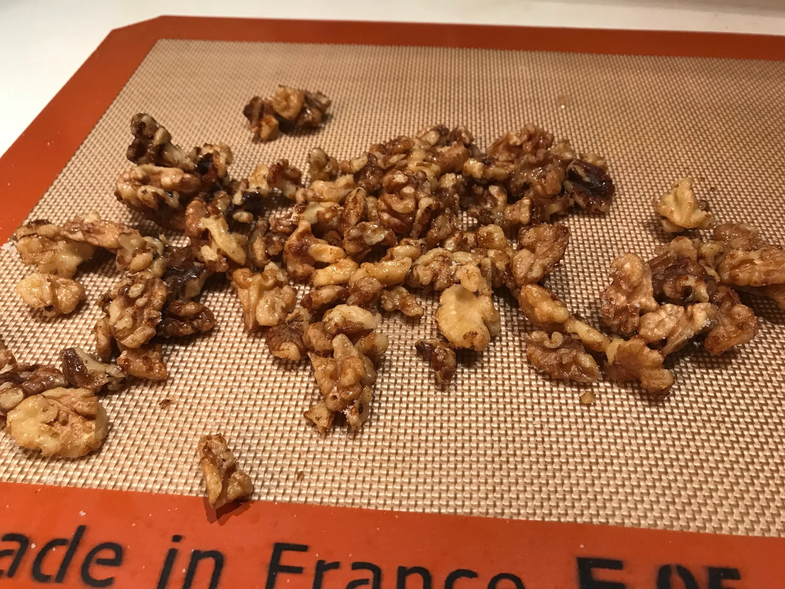 Maple cayenne walnuts cooling.