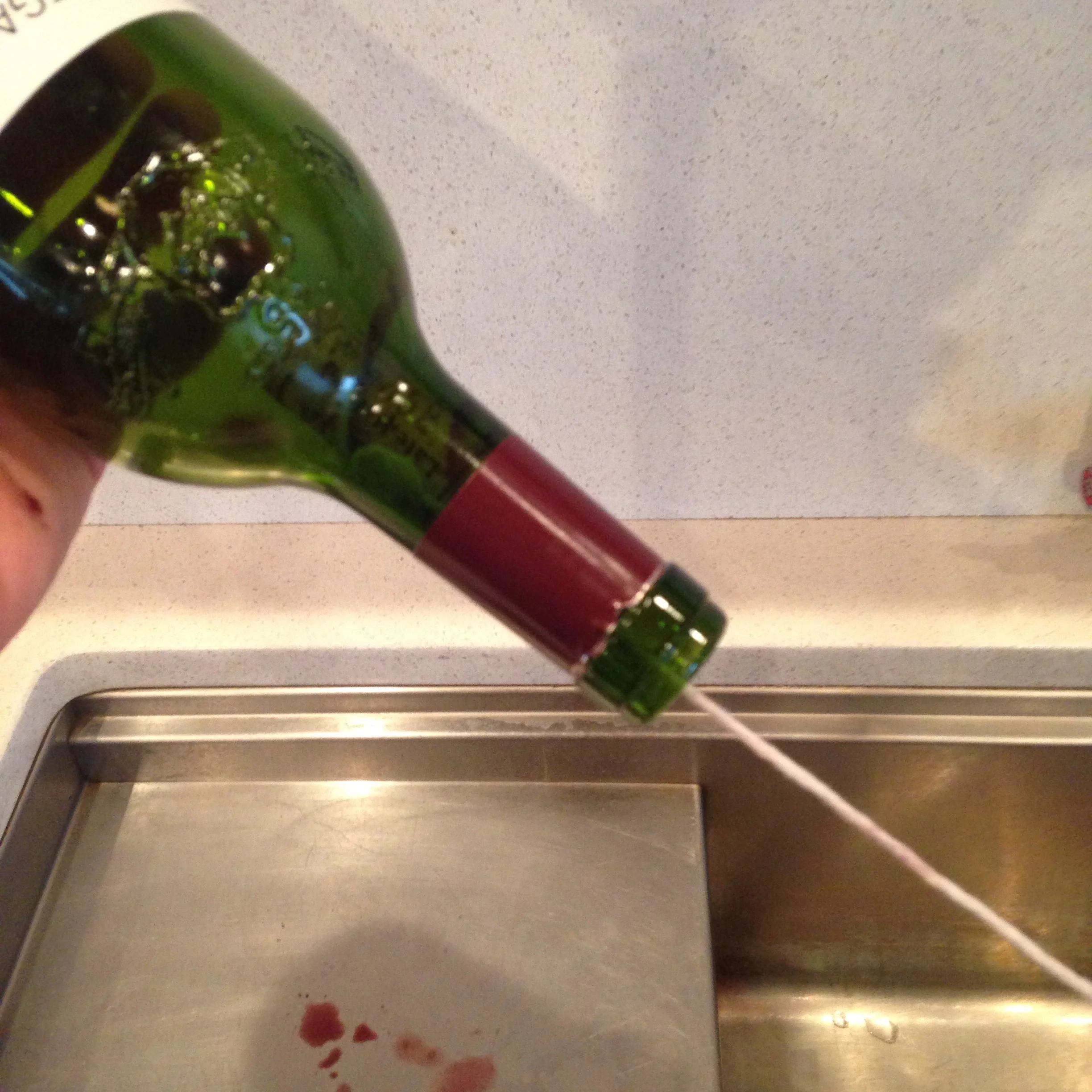 Step 6: Pull on the string. The knot does not have to be behind the cork, just come into friction with it to begin nudging it out.