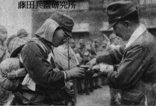 An officer giving sake to a soldier before a mission.