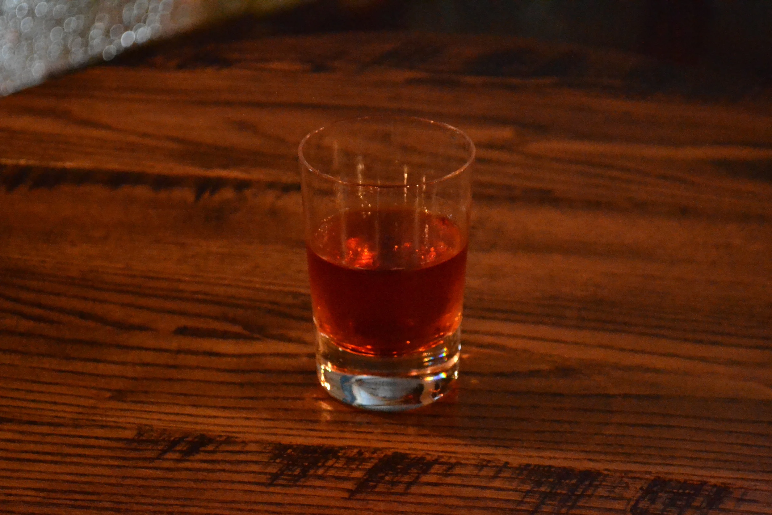 Tenzing Coupe Cocktail. "Man Bites Dog" by Mark Brinker.