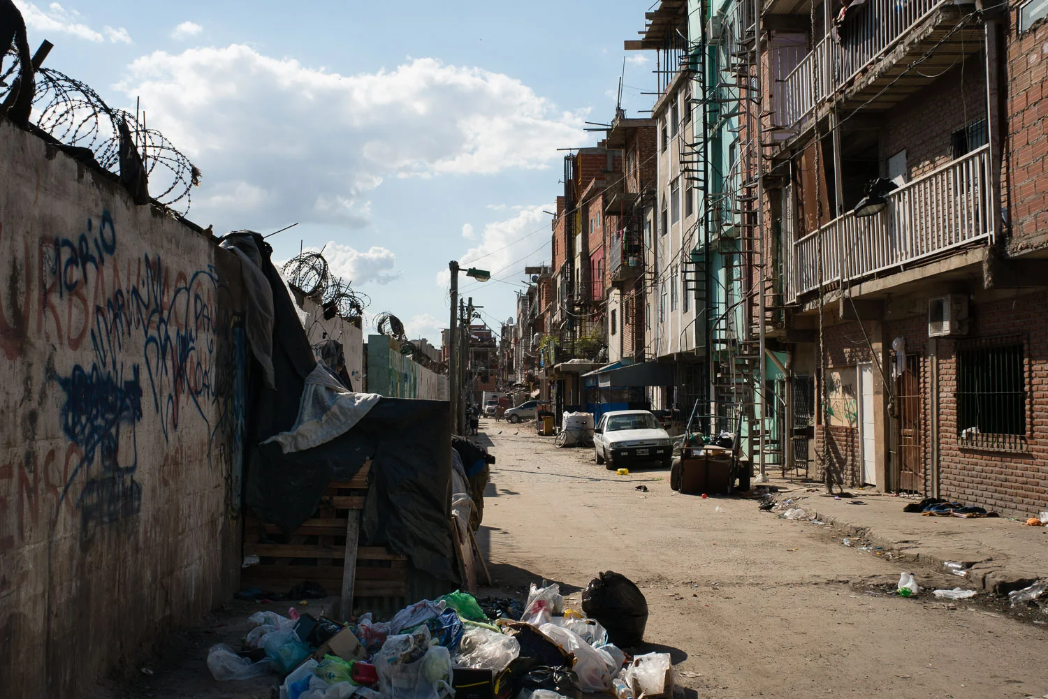 The wrong side of the tracks. Literally. The only way in or out of Buenos Aires most infamous slum, Villa 31.