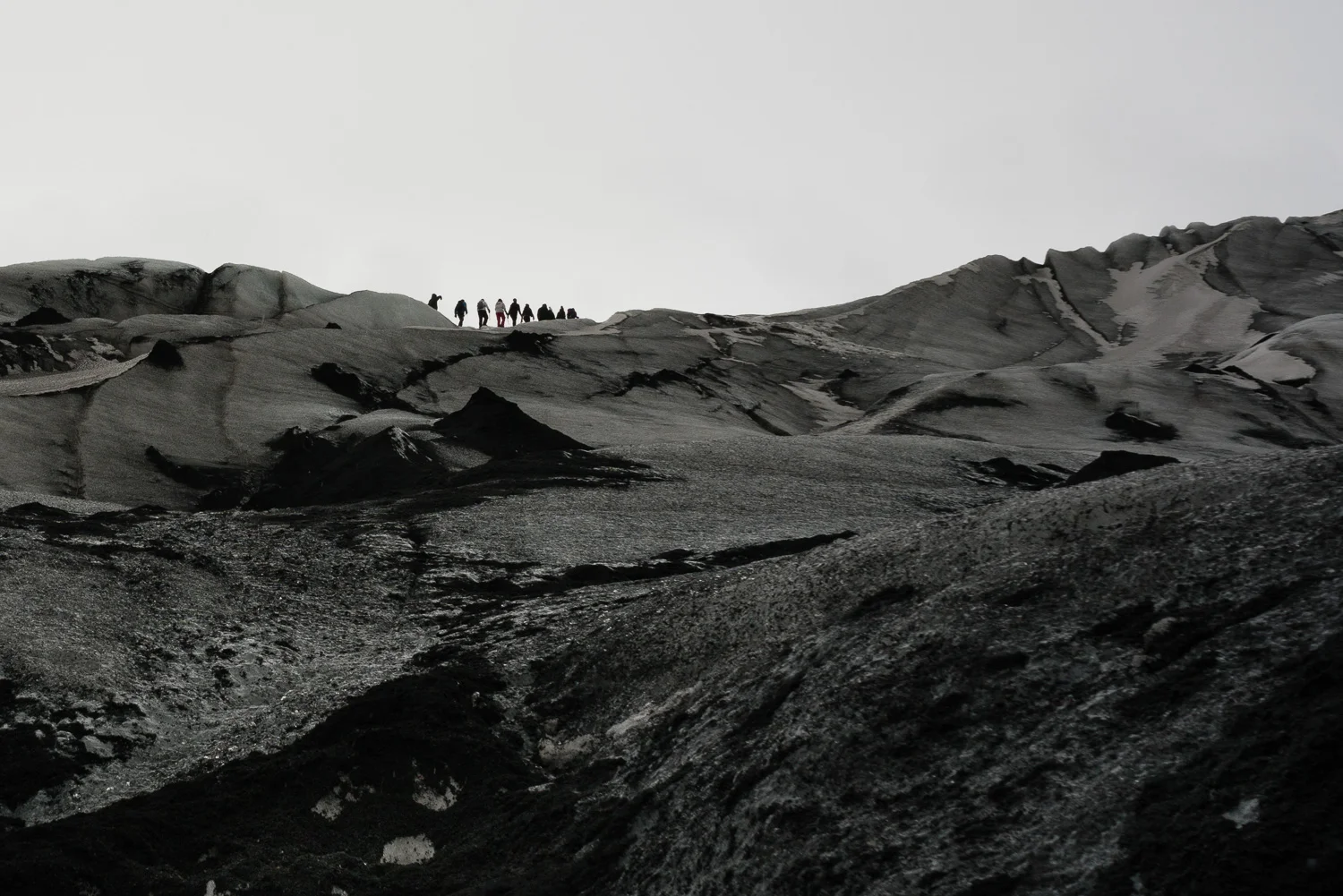 This isn't a monochrome photo rather a volcanic landscape completely void of color. 