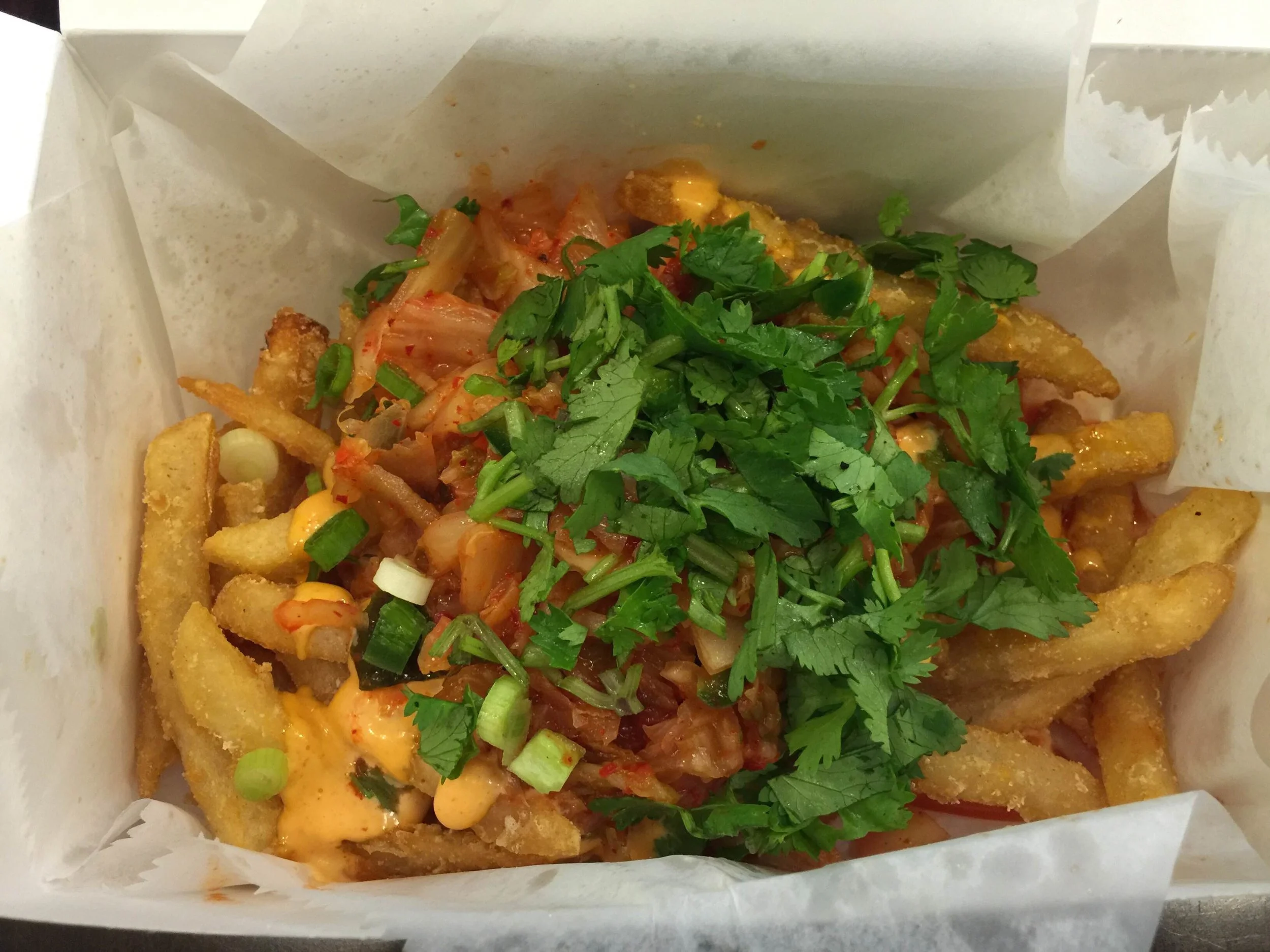 JoJu's Loaded Kimchi Fries. They also do Loaded Banh Mi Fries which are the ingredients of a Banh Mi dumped all over french fries. Disgustingly awesome. 