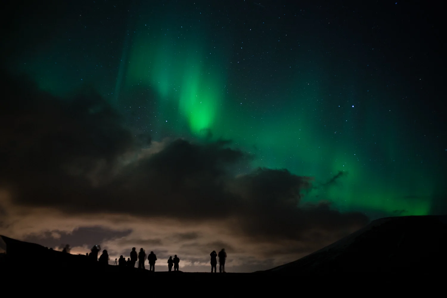 The magnificent Aurora Borealis aka the Northern Lights. Interestingly enough they appear more white to the naked eye but photograph this rich green color.