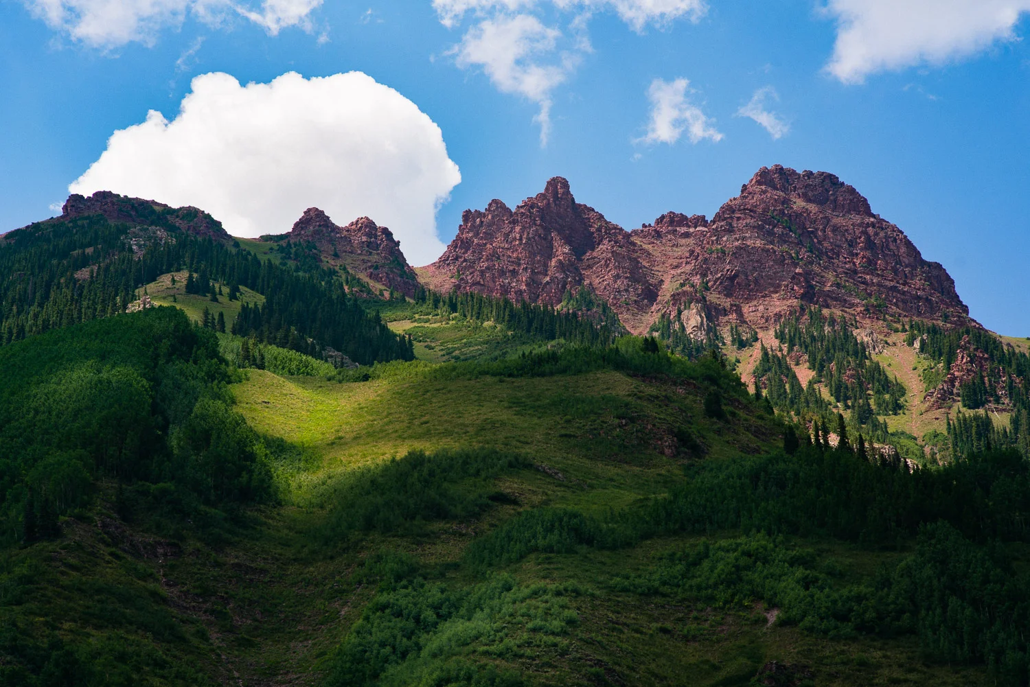 Trippy geography around the Maroon Bells. At this elevation the clouds appear to move much faster than usual, if you just sit and stare at the changing light on the mountains, it's as satisfying as your favorite movie.