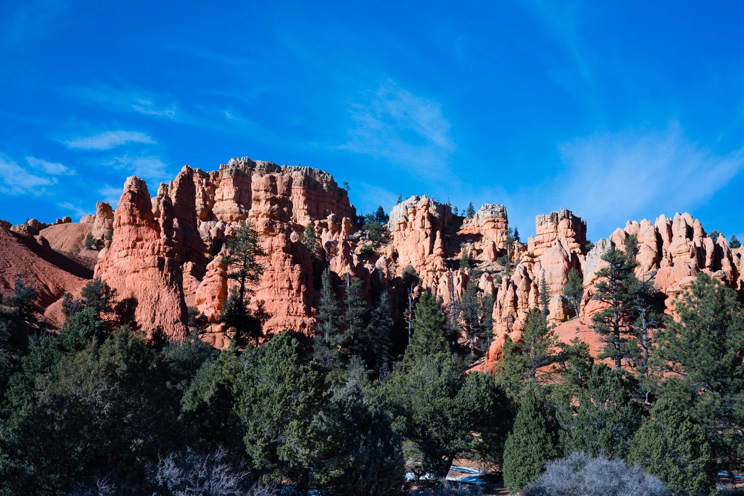These interesting sand stone formations are called hoodoos and are the result of thousands of years of wind and water erosion, much like the mesas in Monument Valley.