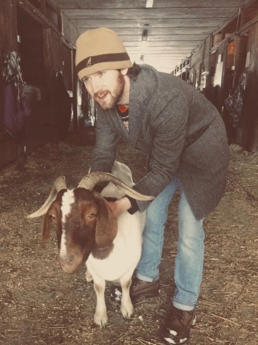 Meir with Zeus, the goat, at Catskill Animal Sanctuary