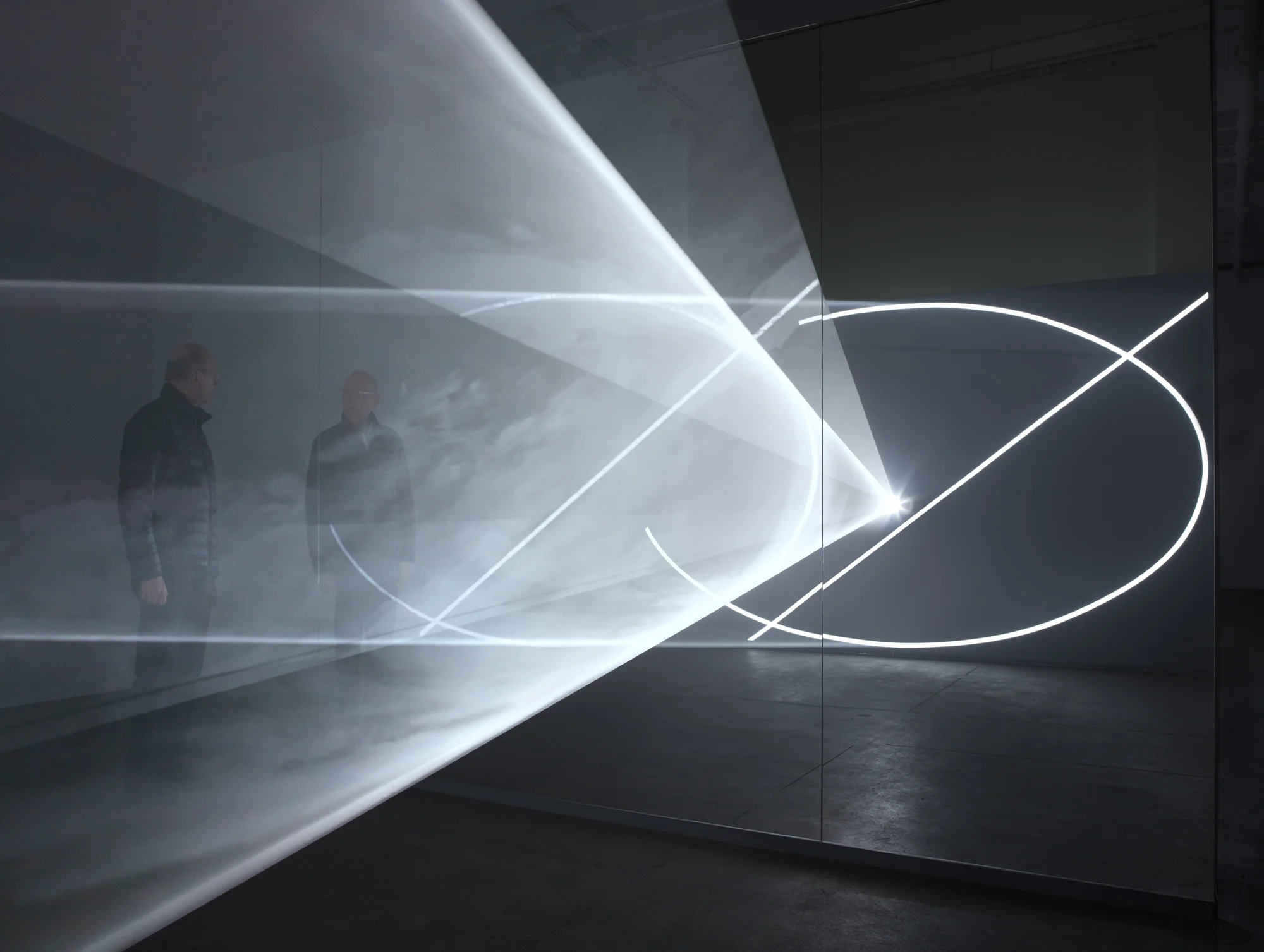 Anthony McCall at Sean Kelly Gallery with his work Split Second (Mirror) , New York, 2019. Photograph by Dan Bradica.