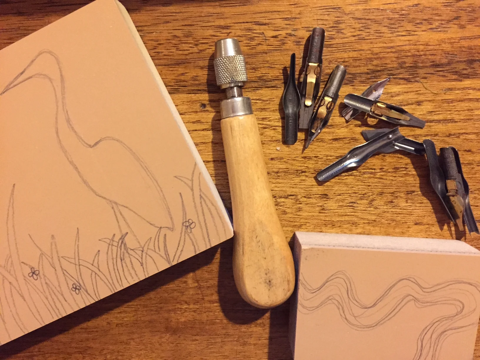 Designing Coastcards on linoleum blocks