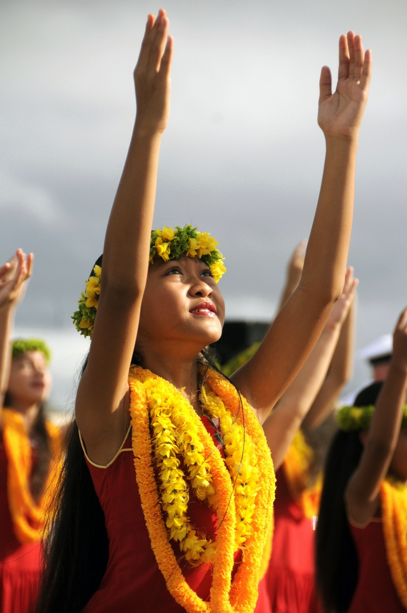 A Hawaiian girl wearing a traditional lei