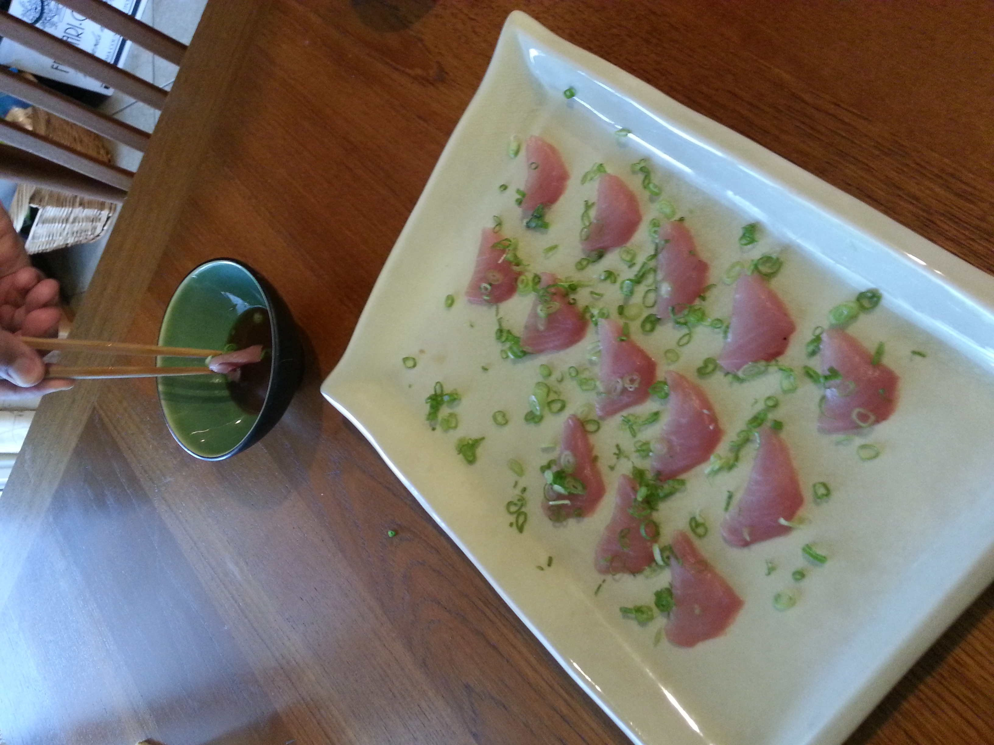 Sashimi served with scallions, ponzu & wasabi