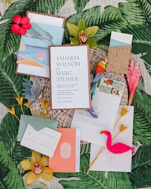 Piña coladas, palm trees, and toes in the sand... This invitation suite we designed for @megawattevents makes us want to buy a one way ticket to Aruba ASAP. // photo: @rebeccayale