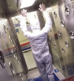Entering A Clean Room Through A Vacuum Shower