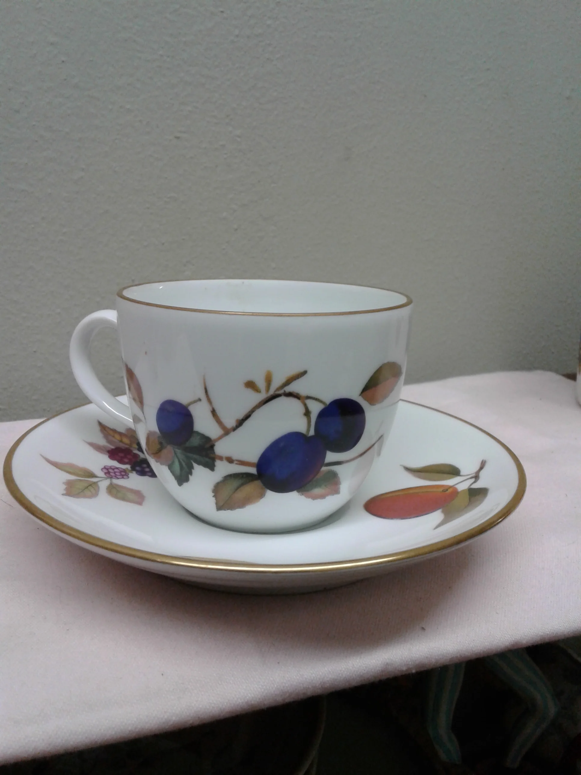 Royal Worcester Evesham Gold cup and saucer 