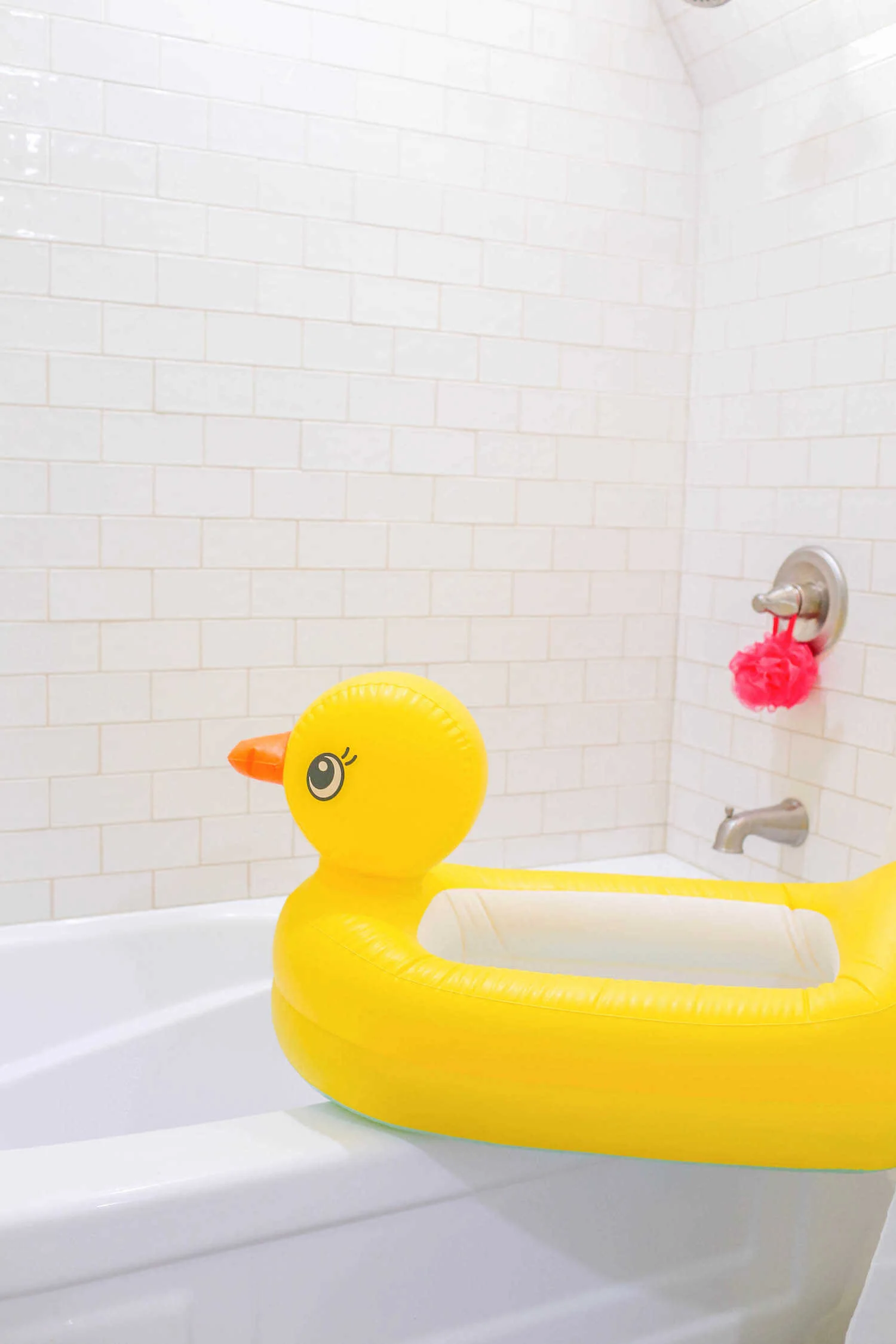 Gennifer Rose - Everything You Need to Know Before You Before You Begin Remodeling Your Bathroom - Munchkin Duckie Bath Tub for Babies.