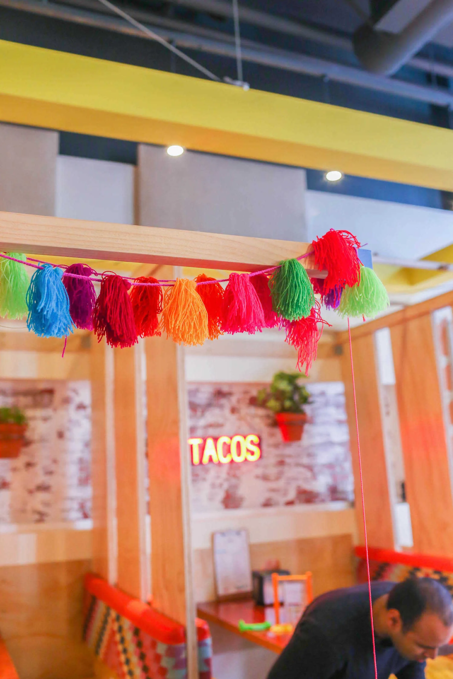 Colorful and modern Mexican-themed interiors at Snap Taco restaurant.