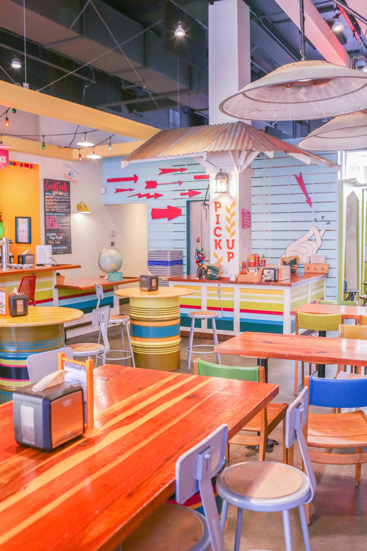 Colorful and modern Mexican-themed interiors at Snap Taco restaurant.