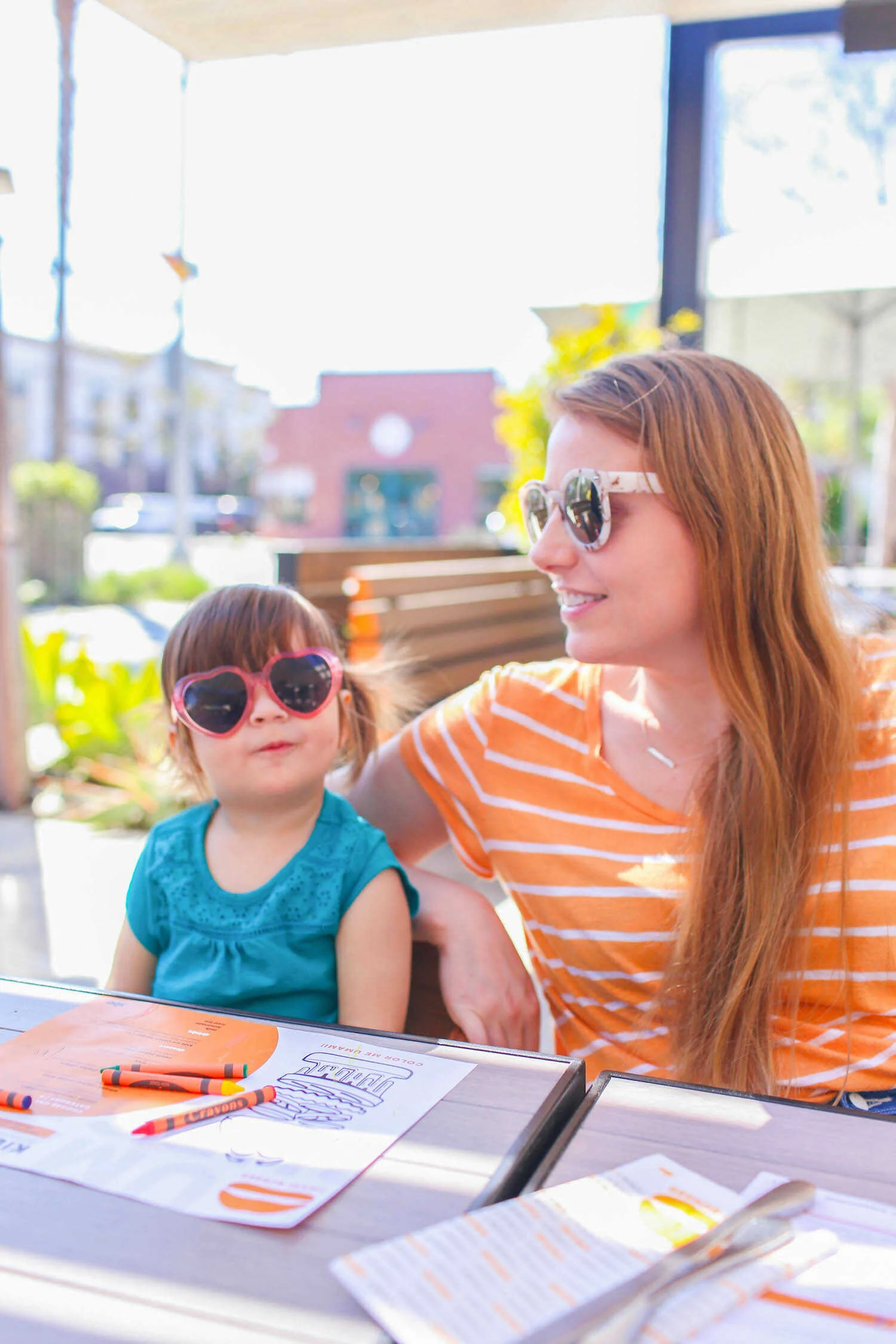 Eating lunch on the patio at dog-friendly restaurant Umami Burger.