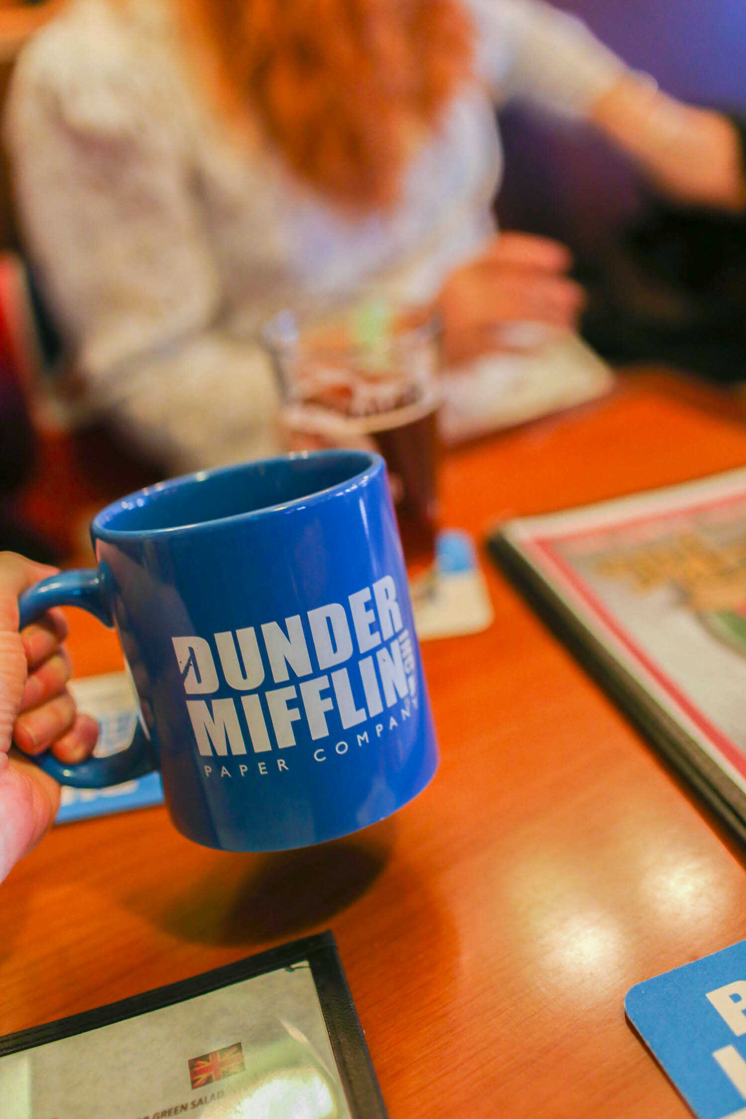 Dunder Mifflin blue coffee mug from Etsy.