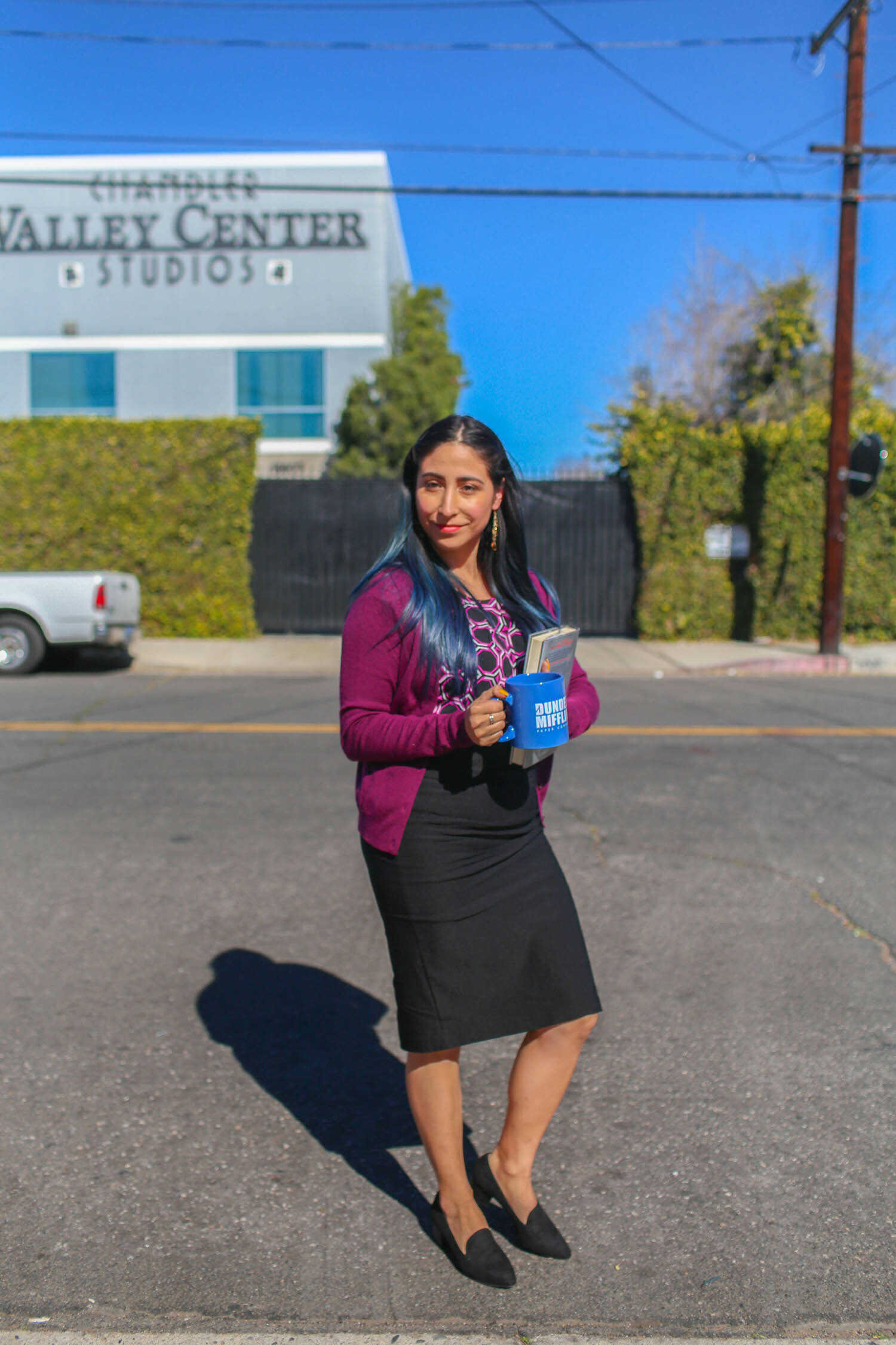 Brianna dressed as Kelly Kapoor in front of the Dunder Mifflin office building in Panorama City.