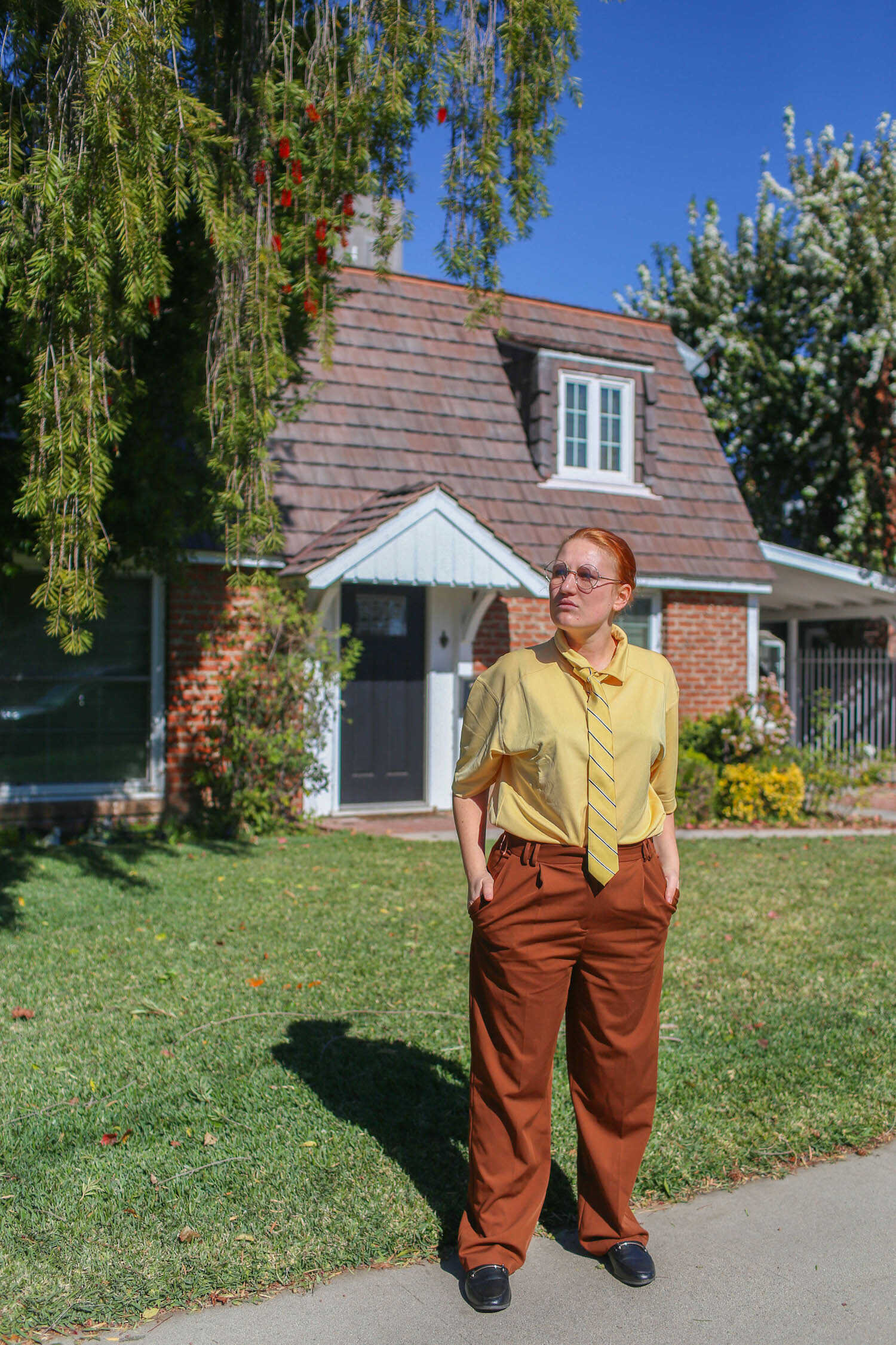 Kara wearing Dwight  costume standing in front of Jim and Pam's house in Van Nuys.