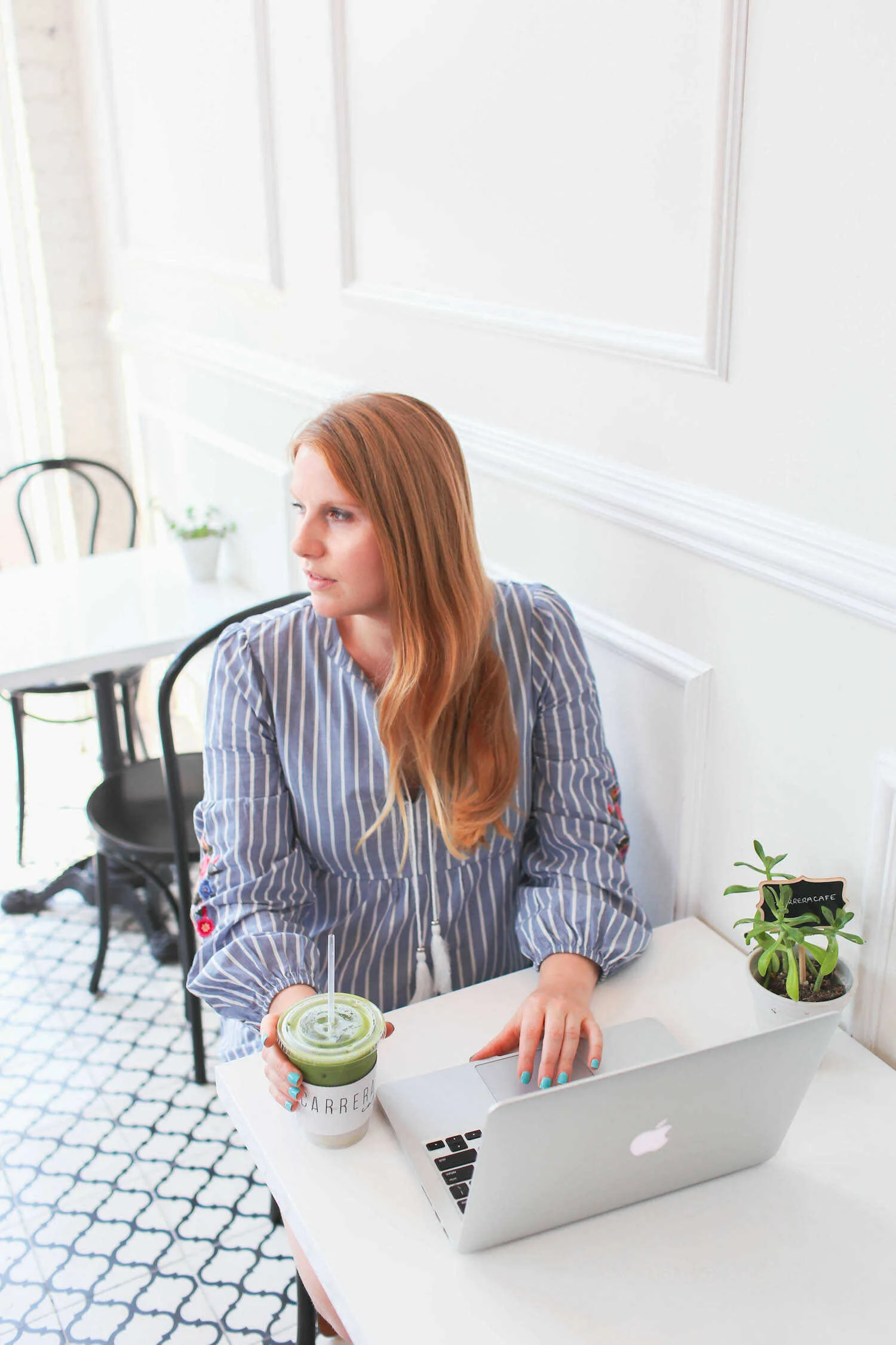 Drinking iced matcha inside Carrera Cafe on Melrose Ave in West Hollywood.