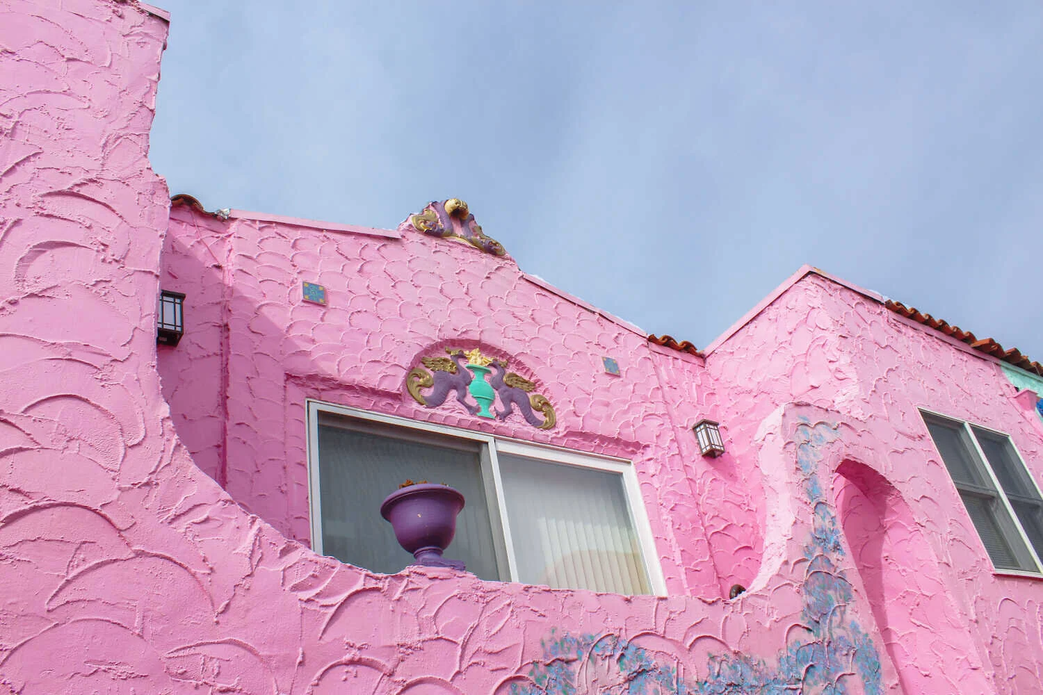 Pastel pink Venetian vacation rental condo in Capitola Village.
