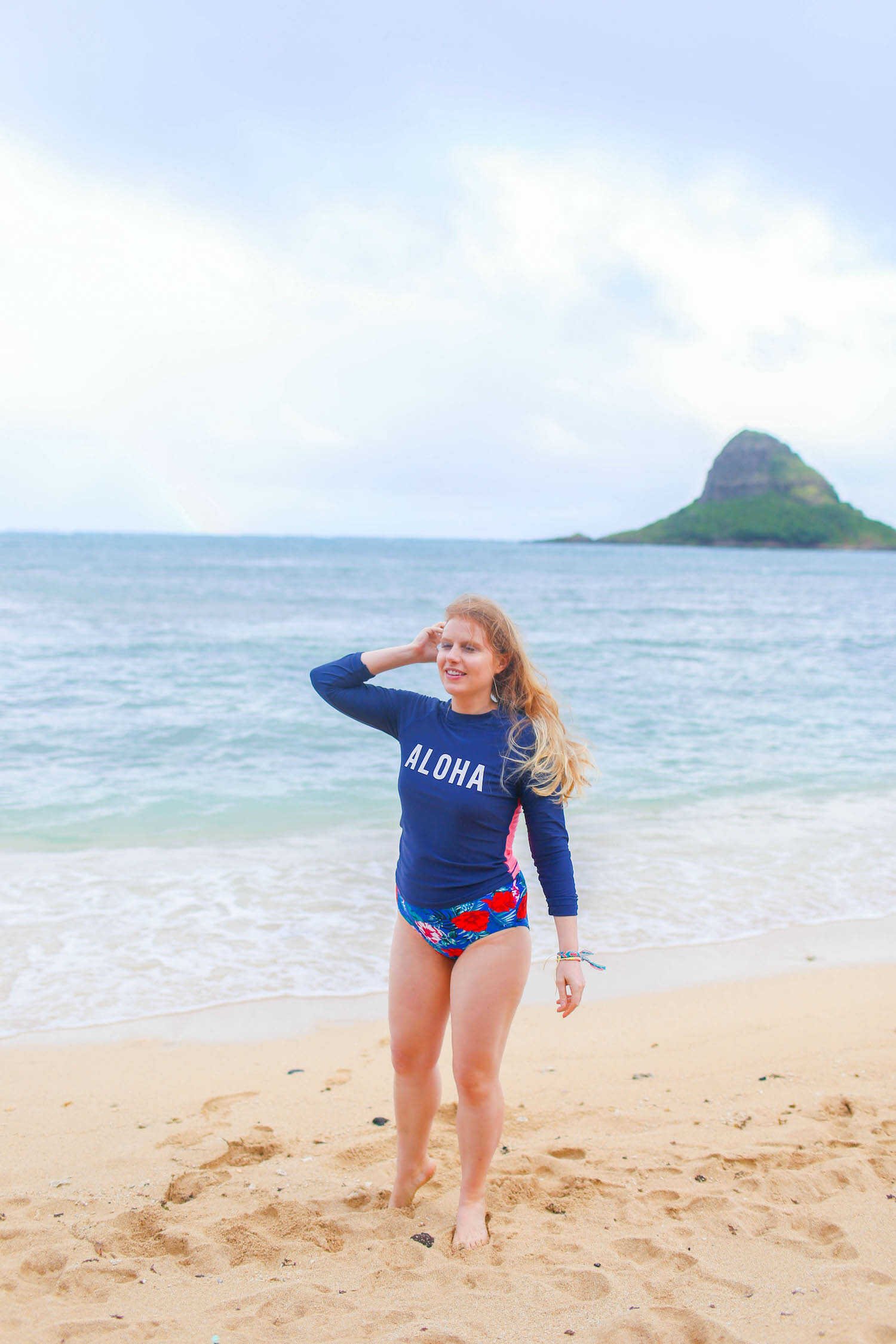 Top 10 Epic 30th Birthday Travel Destinations - The beach at Kualoa Regional Park with China Man Hat Island in the background.