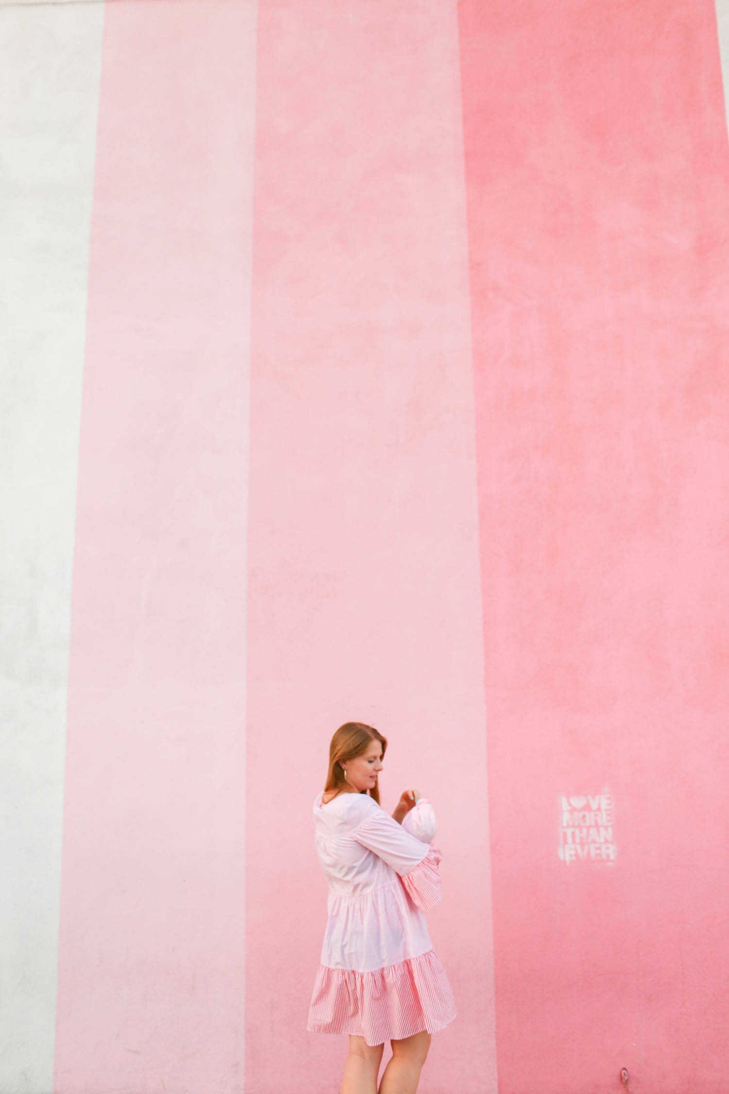Beautiful Places in San Diego to Take Family Pictures - Pigment’s Pink Wall in North Park.