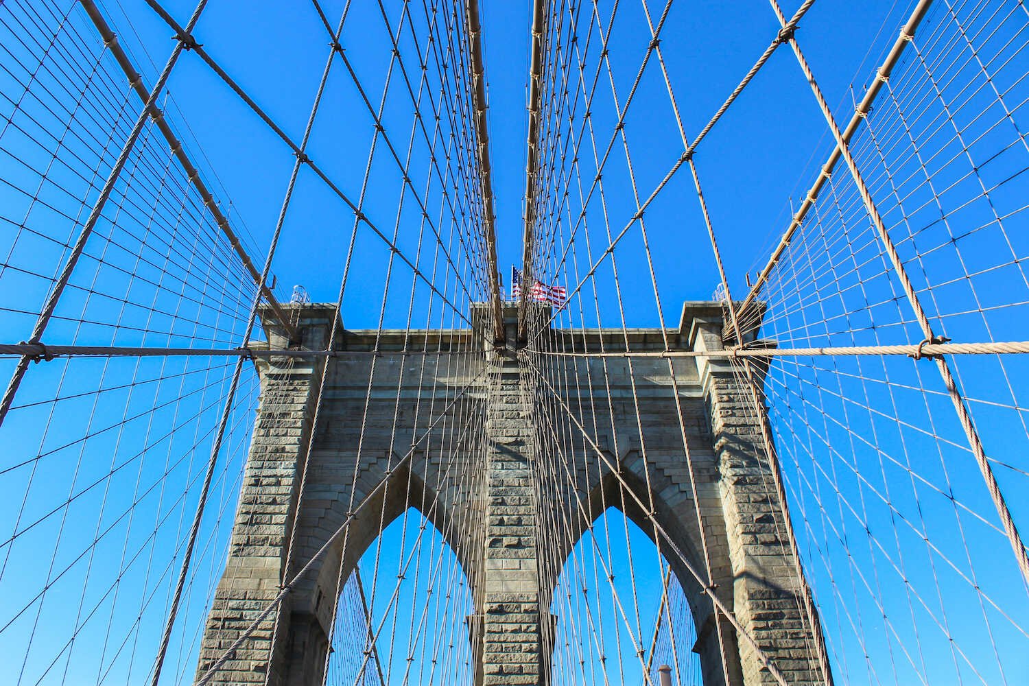 Top 10 Epic 30th Birthday Travel Destinations - Walking across the Brooklyn Bridge in New York City.