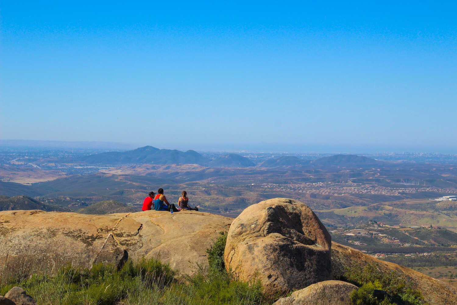 Beautiful Places in San Diego to Take Family Pictures - Views from the Mount Woodson trail up to Potato Chip Rock.