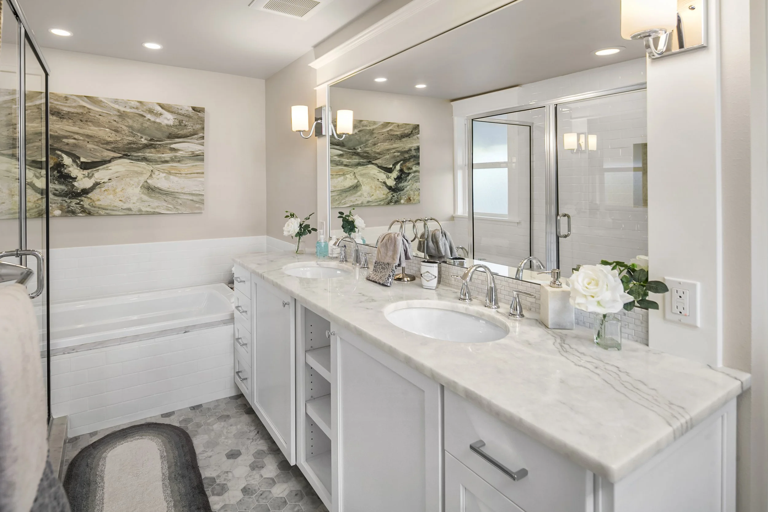 Primary bathroom — after: Reconfigured primary bathroom after whole-home renovation