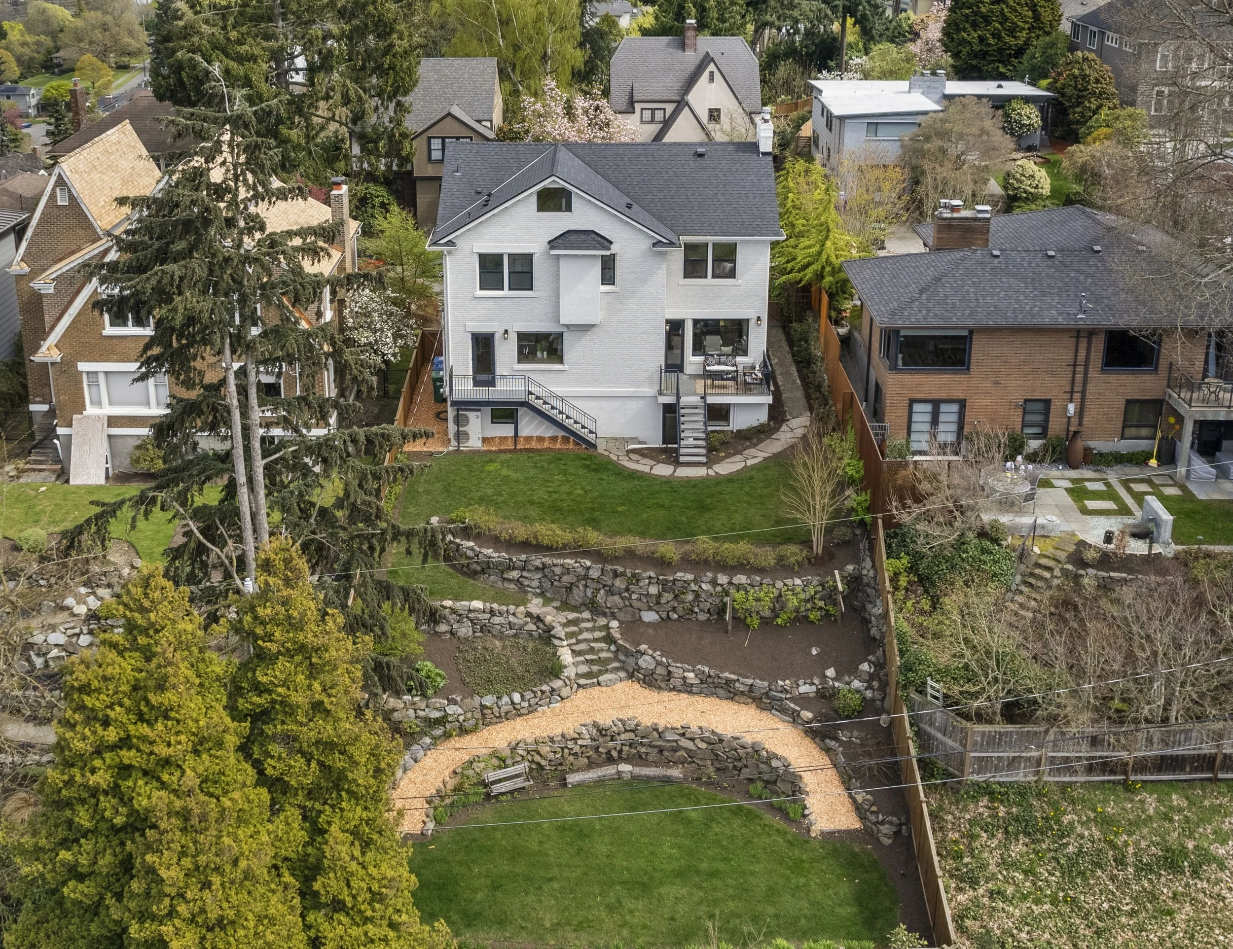 Terraced Queen Anne Backyard and Family Play Lawns