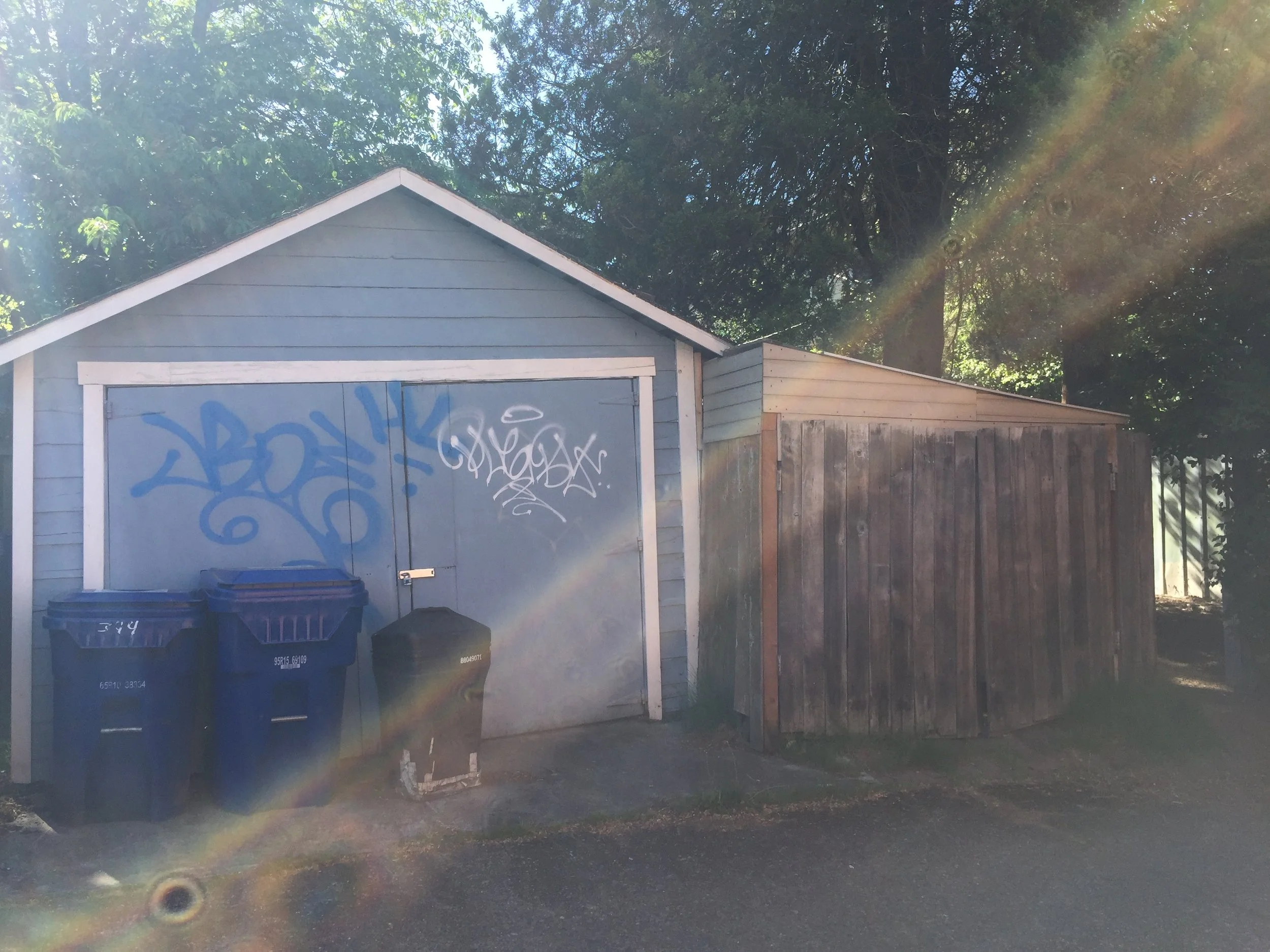 Garage — before: Deteriorated detached garage before reconstruction