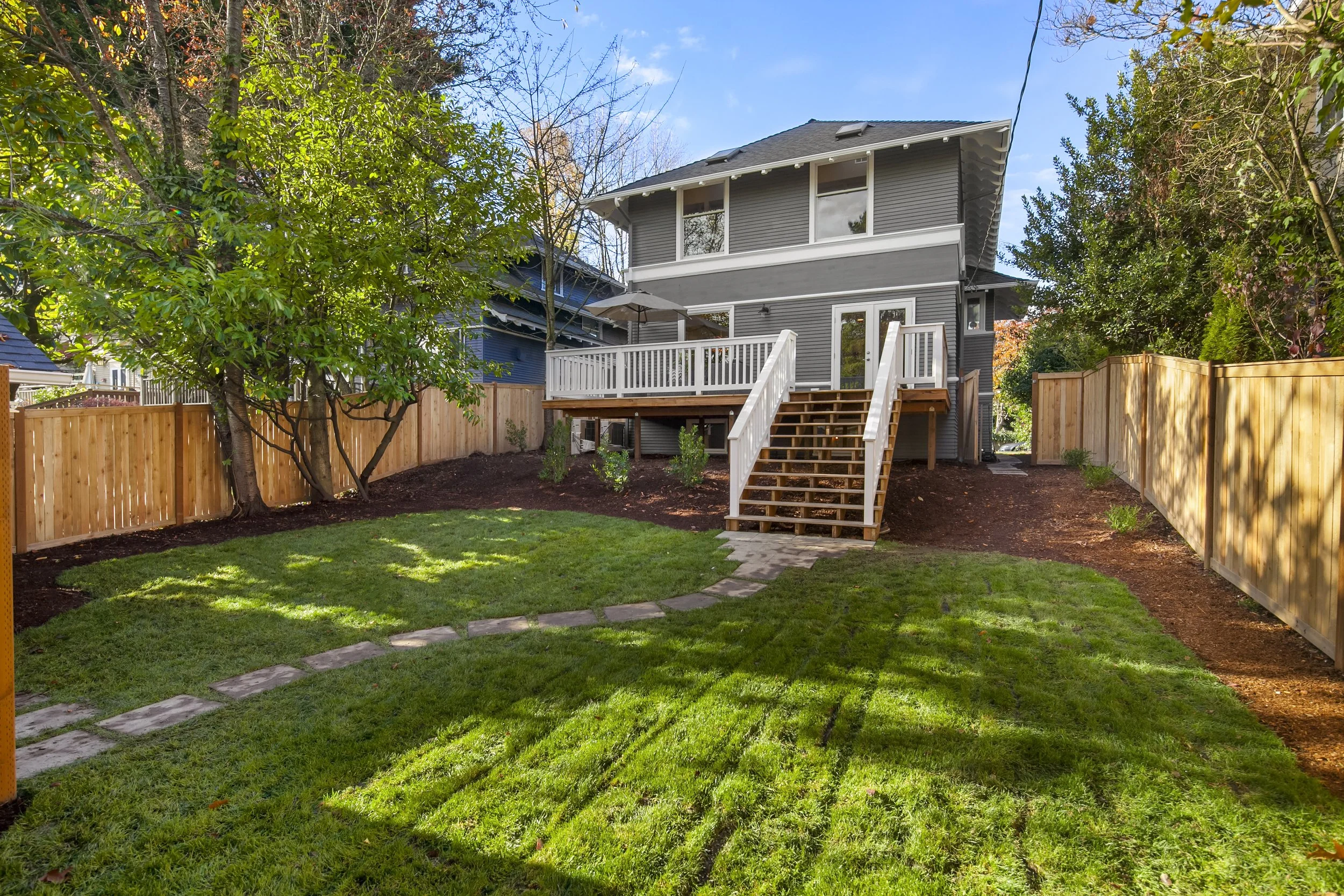Renovated Backyard with Expanded Rear Deck