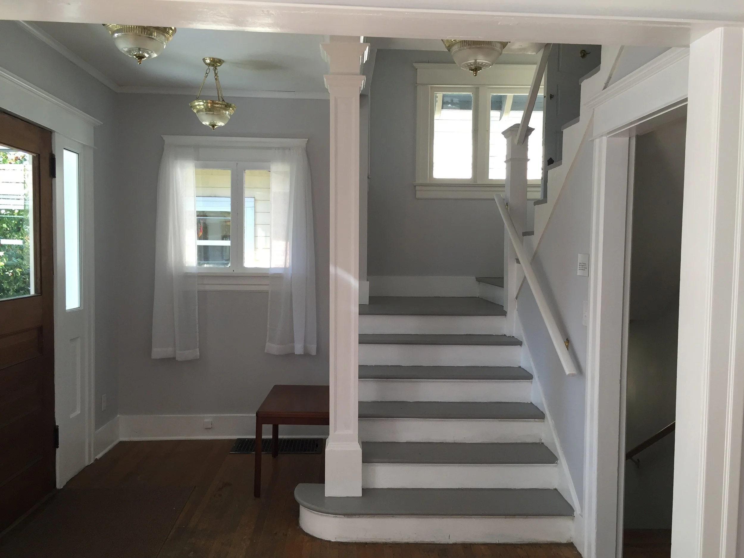 Staircase — before: Original painted staircase before restoration