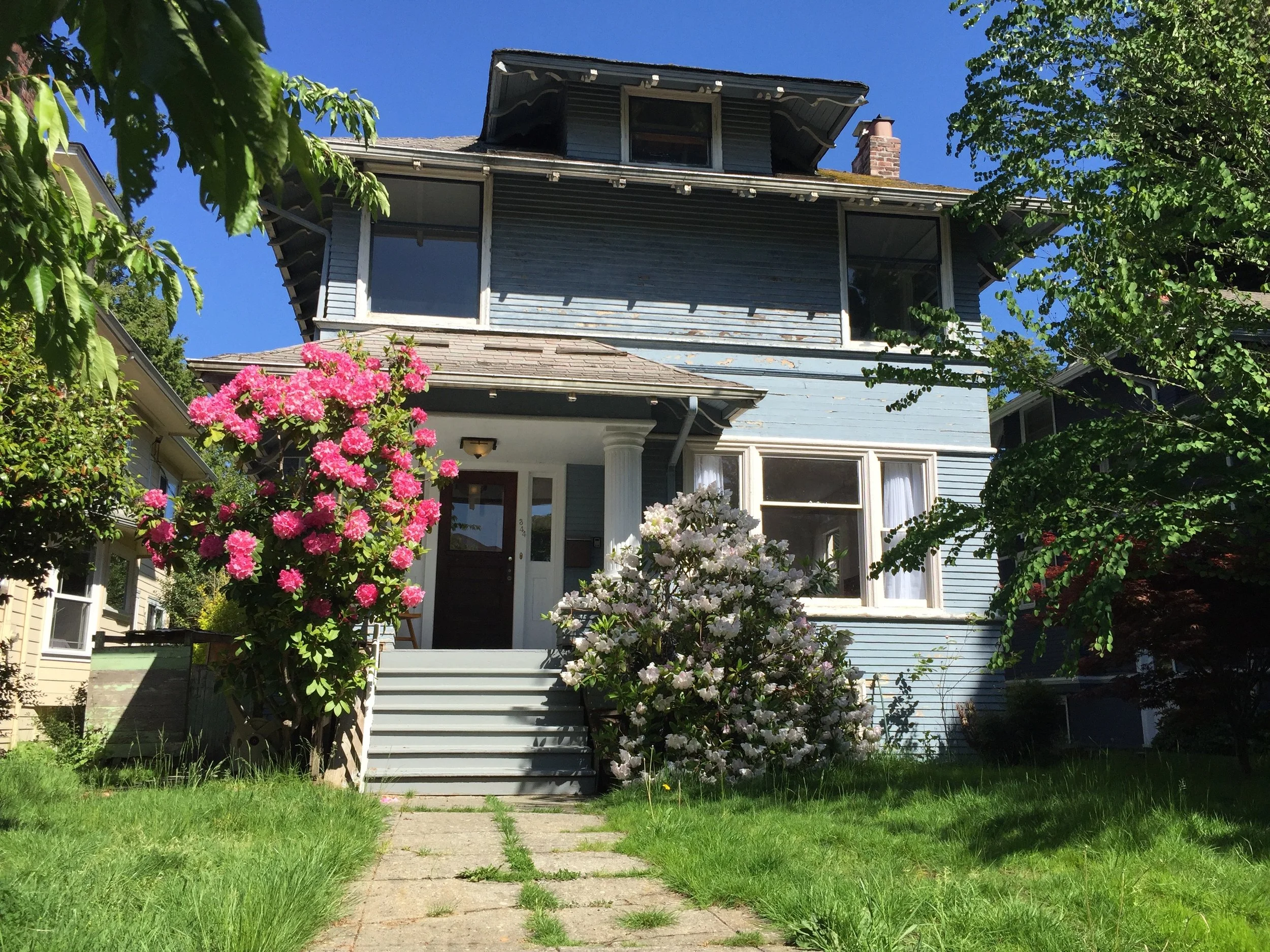 Front exterior — before: Capitol Hill Seattle Foursquare exterior before whole-home renovation and restoration