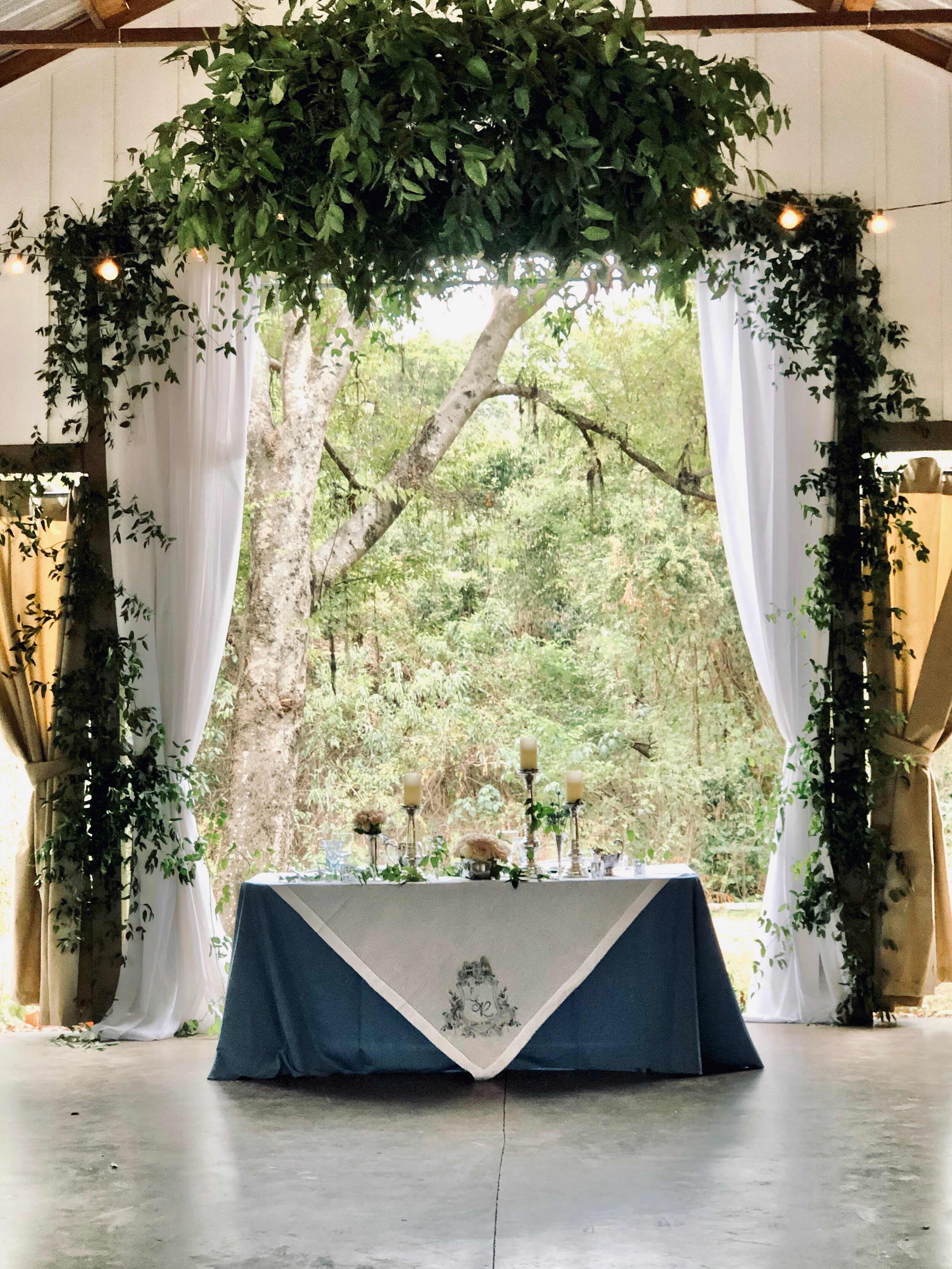 Sweetheart table in pavilion.jpeg