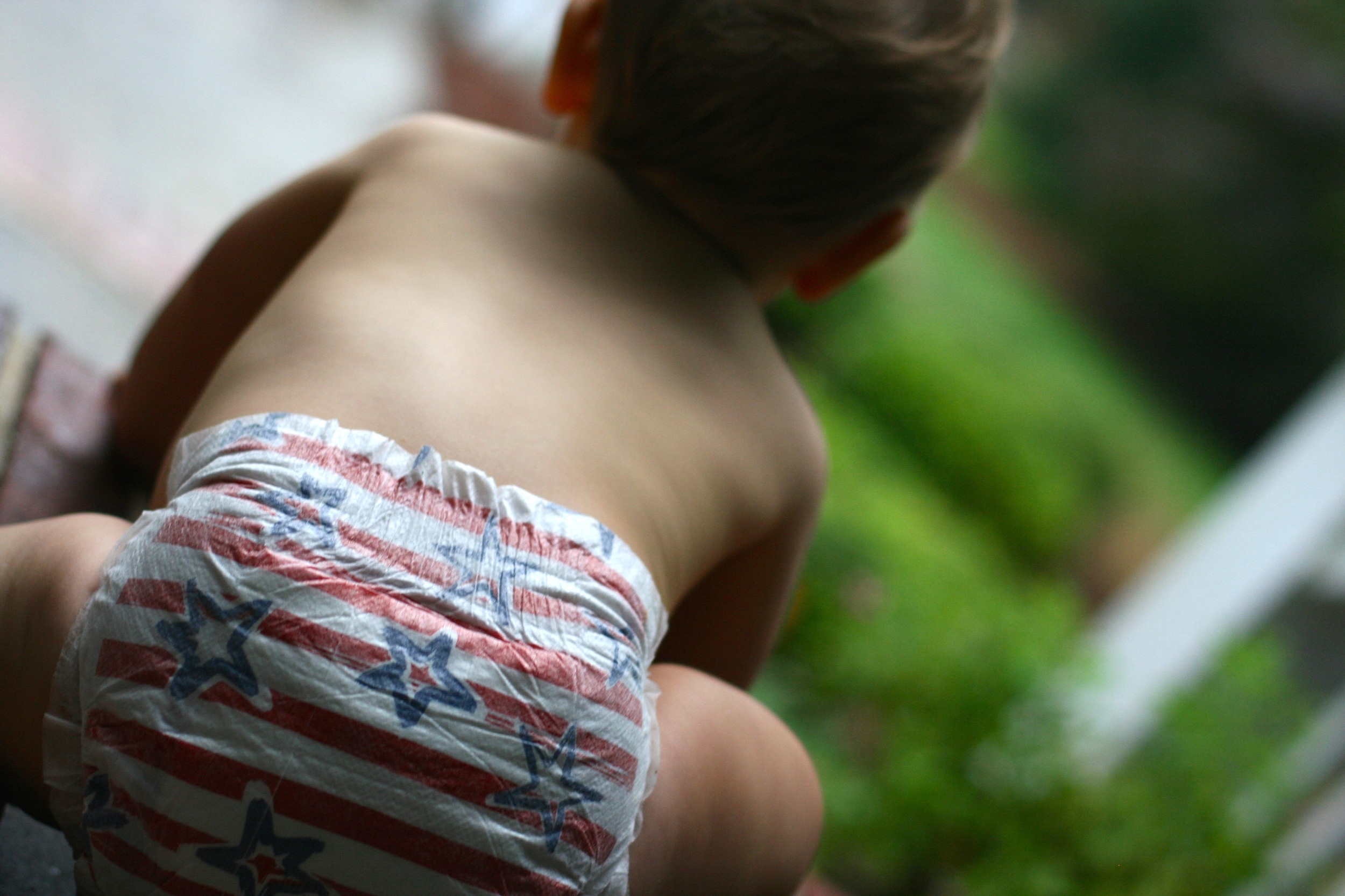 Our 4th of July was filled with house hunting, barbecue sandwiches and watching Everett watch the rain. In the cutest diapers in the land, of course.