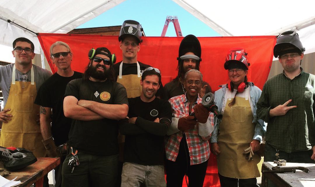 A happy crew of new metal shop graduates!