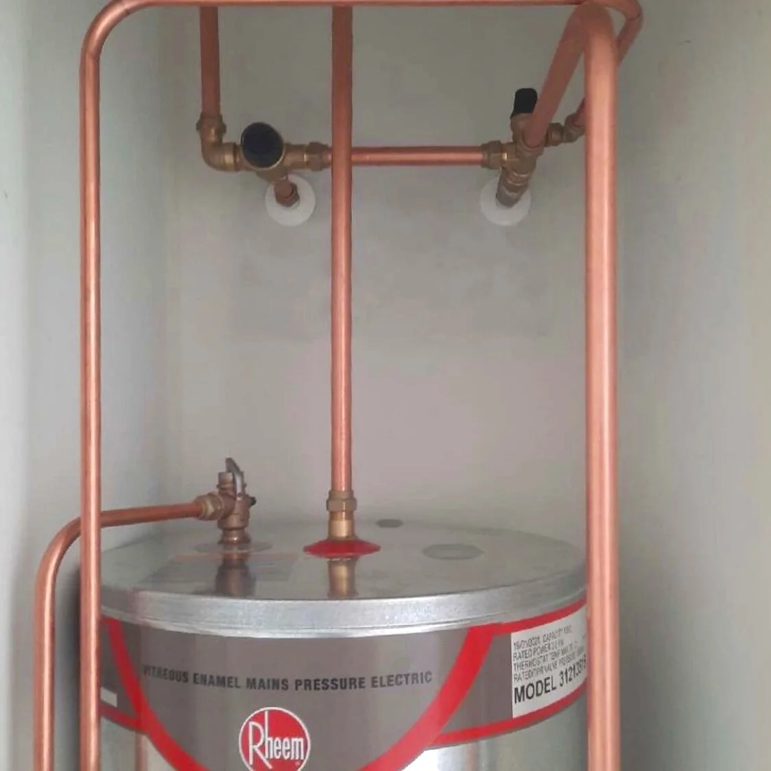 Hot water install, townhouse development, Henderson