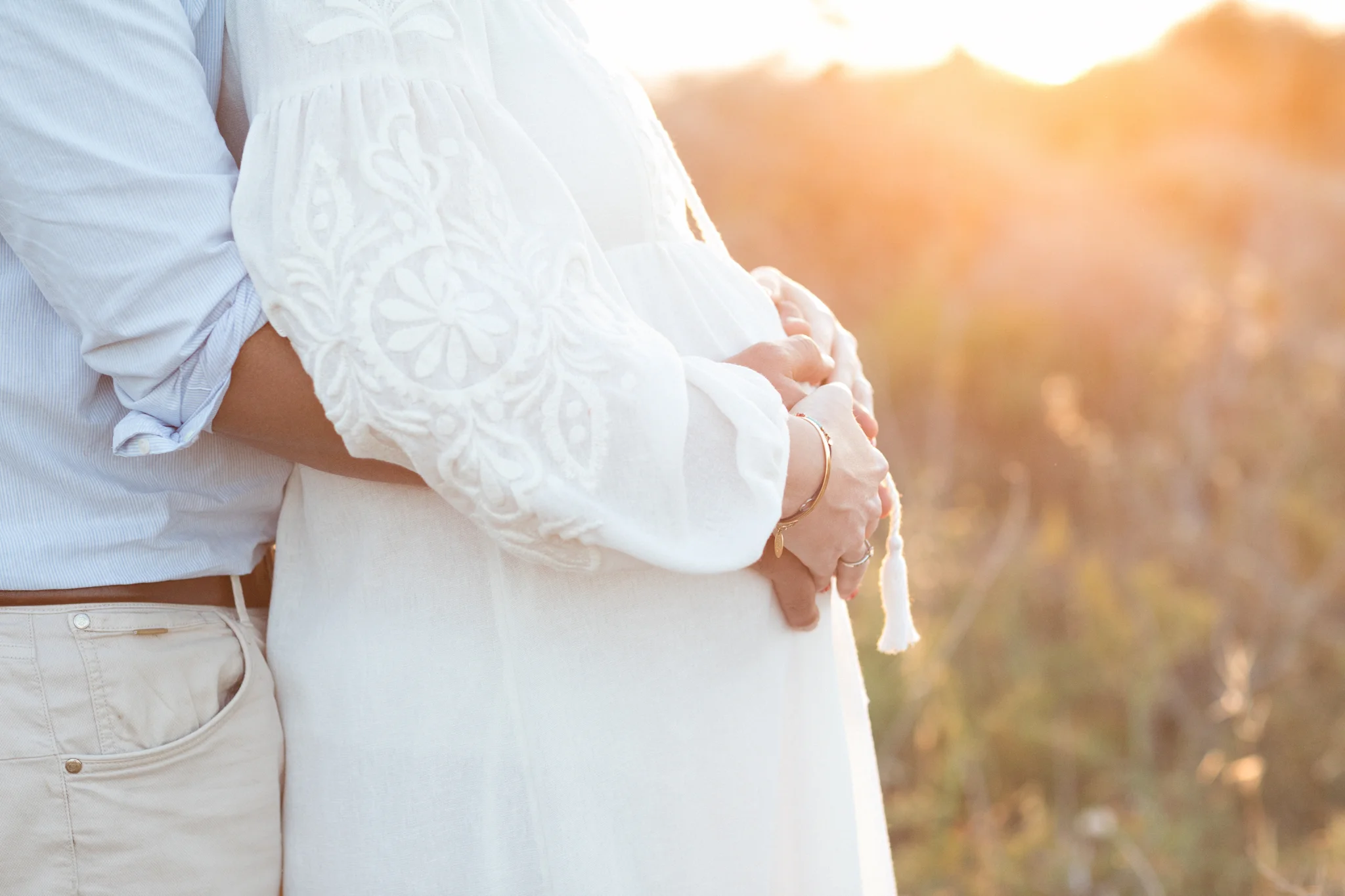 baby bump, baby kicking in belly, holding hands, gorgeous sunset of malta, hugging, relaxed photo shoot in malta