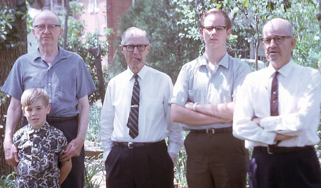 My Grandfather (With Cigar), his brothers and my oldest brother, and me!