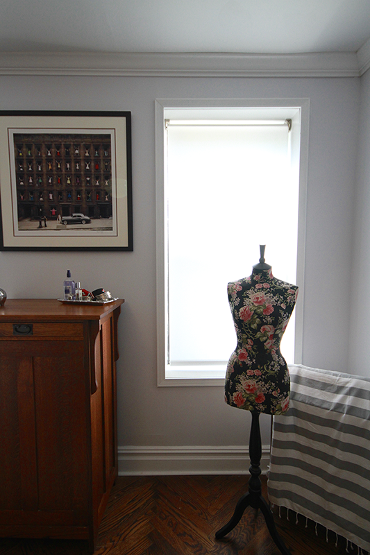 My jewelry chest and a dress form from England frame the room