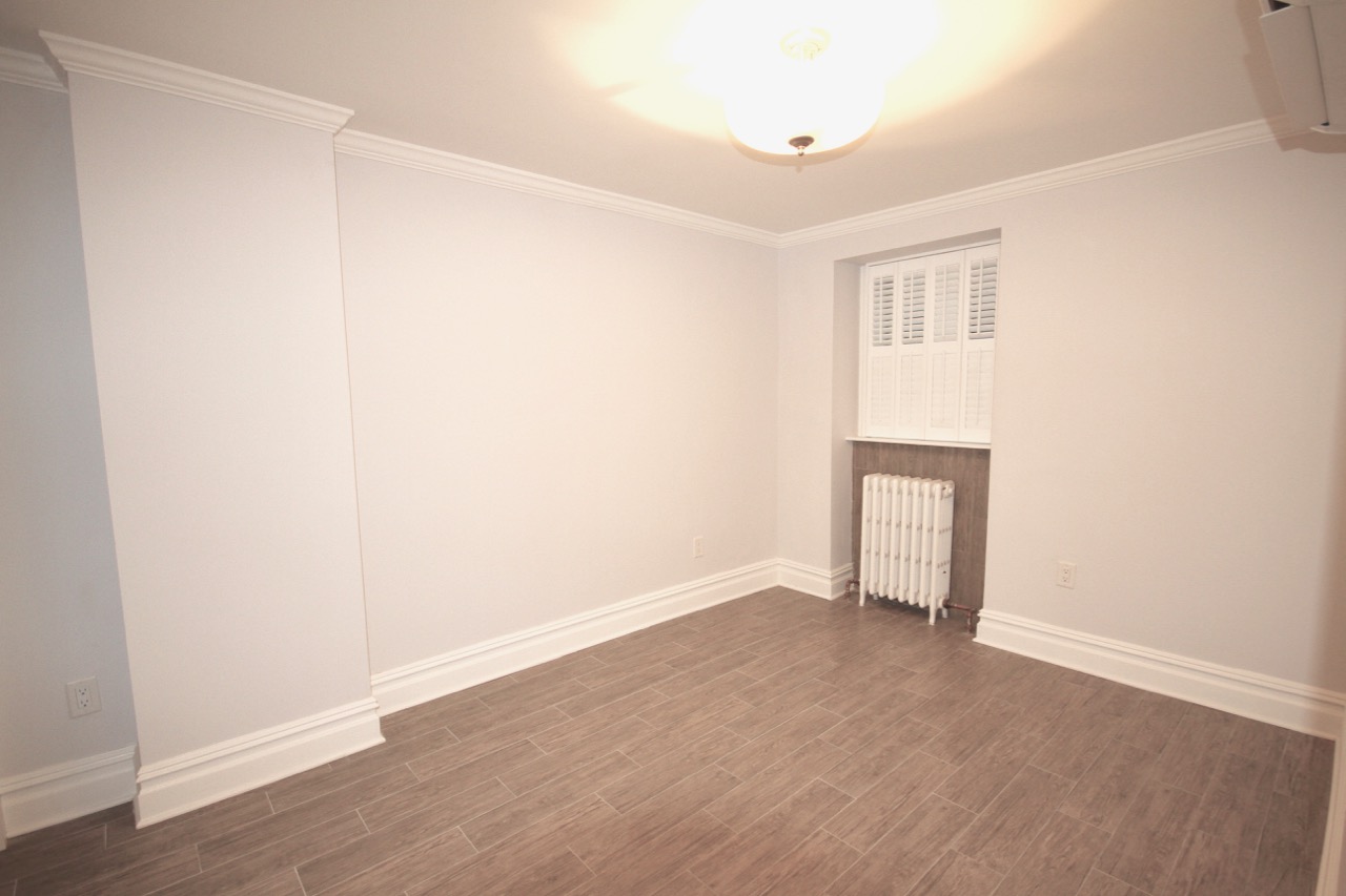 The bedroom is small but will hold a king size bed.
