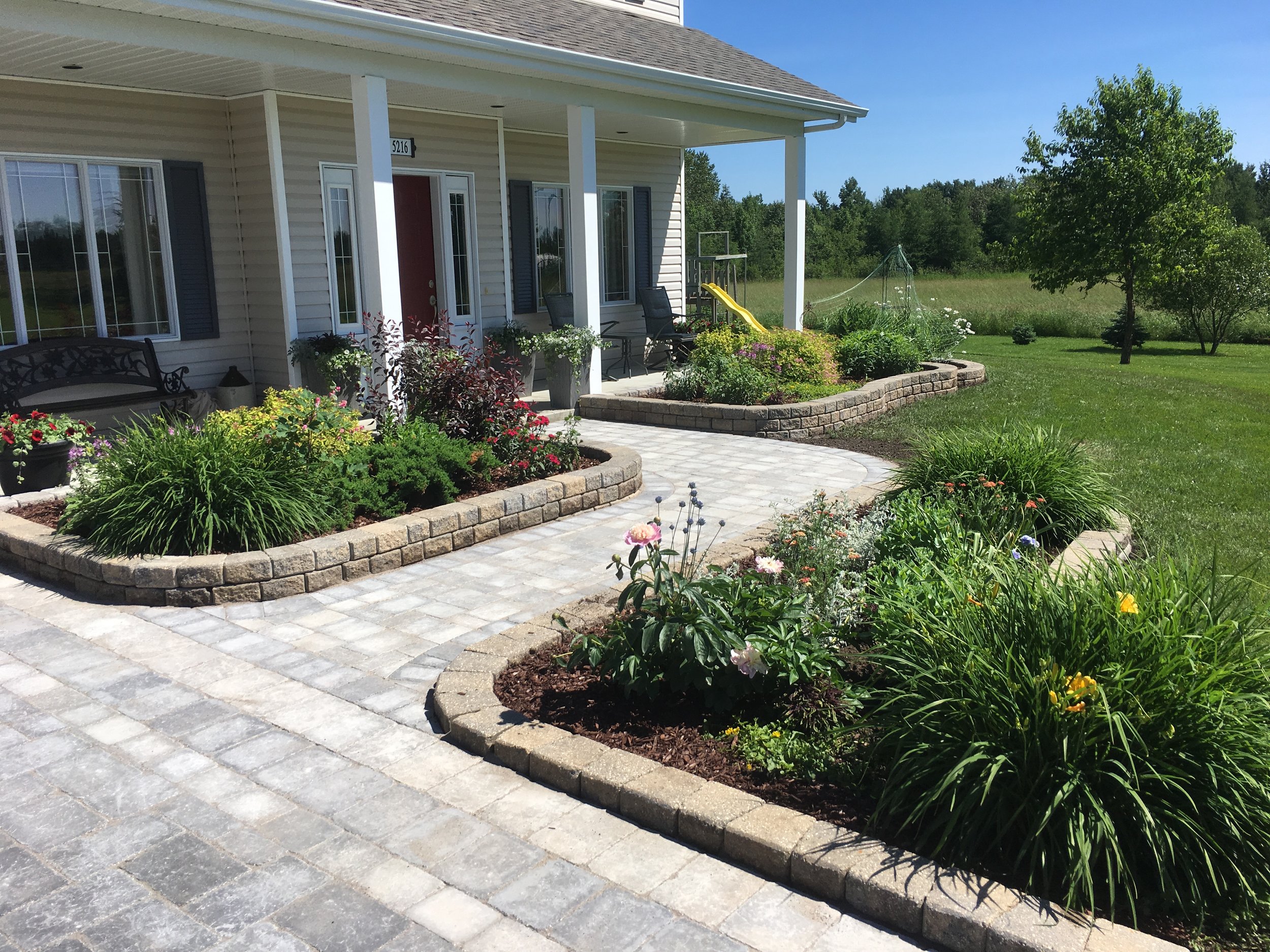 flower beds and front walkway/landing