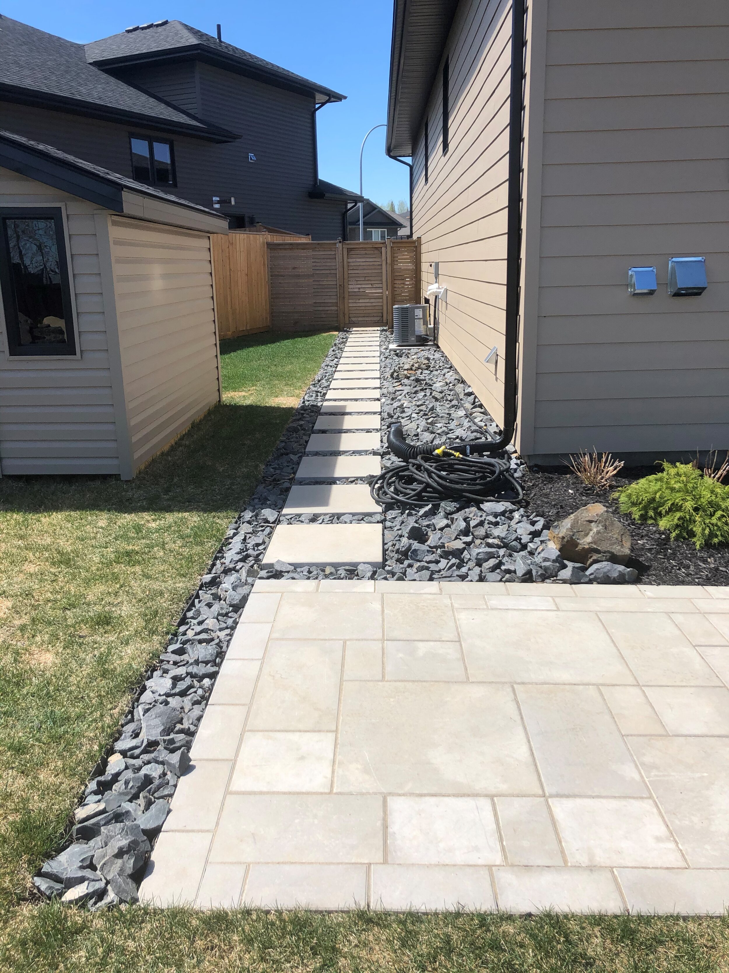 Stepping Stone style walkway made with Barkman Broadway pavers